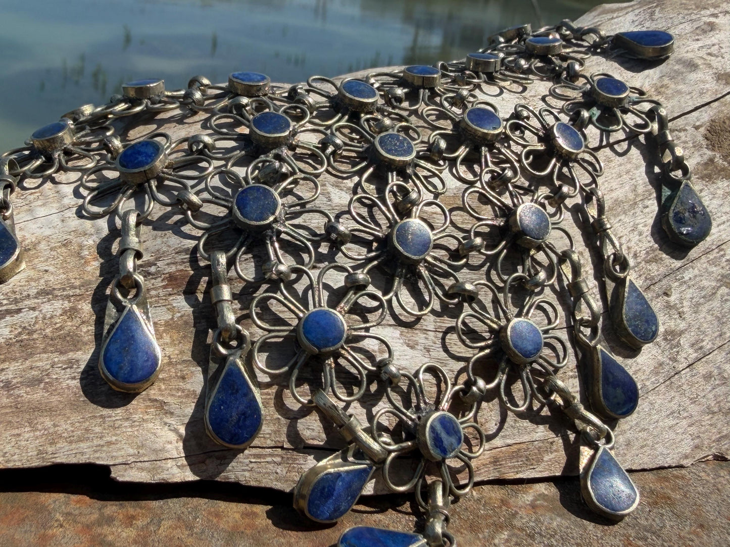 Absolutely stunning vintage waterfall necklace made with Lapis and alpaca silver. Unusual lapis necklace.