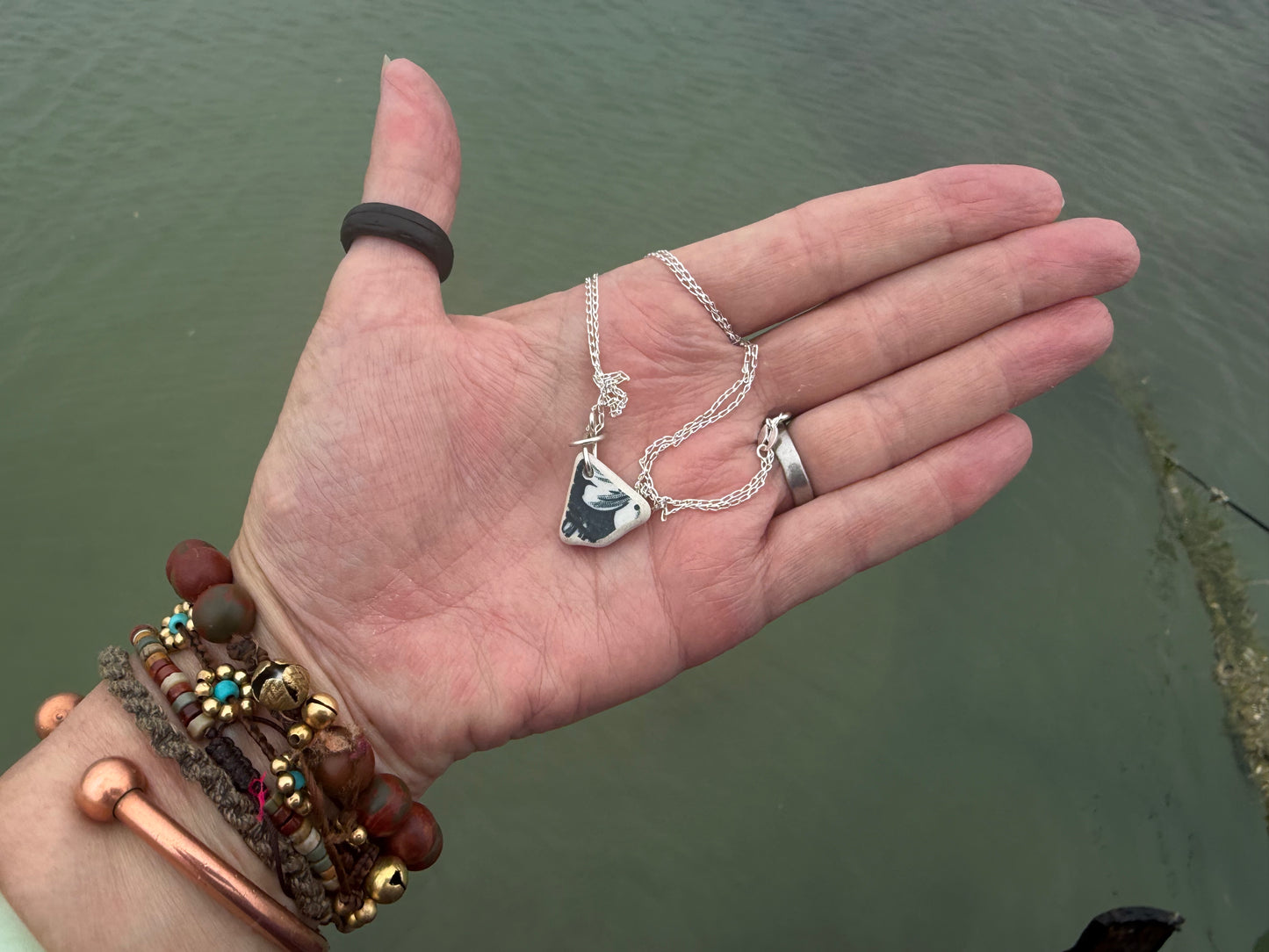 Eco friendly sea ceramic necklace on a sterling silver chain. Eco friendly jewellery, ethical jewellery. Eco friendly necklace.