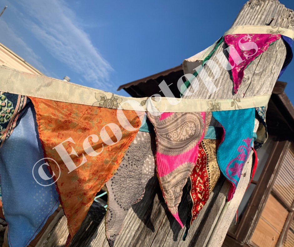 Recycled bunting made from sari off cuts.