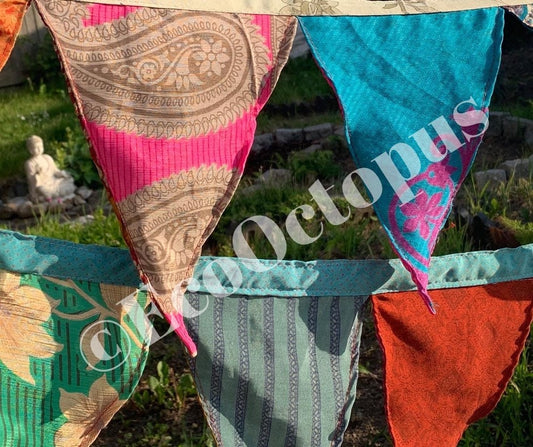 Recycled bunting made from sari off cuts.