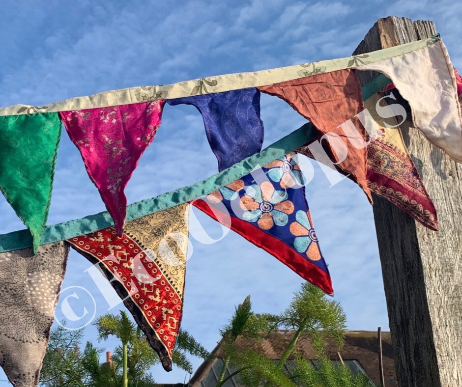 Recycled bunting made from sari off cuts.