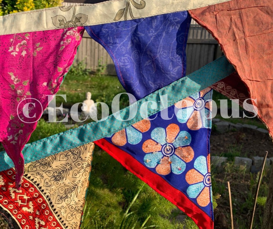 Recycled bunting made from sari off cuts.