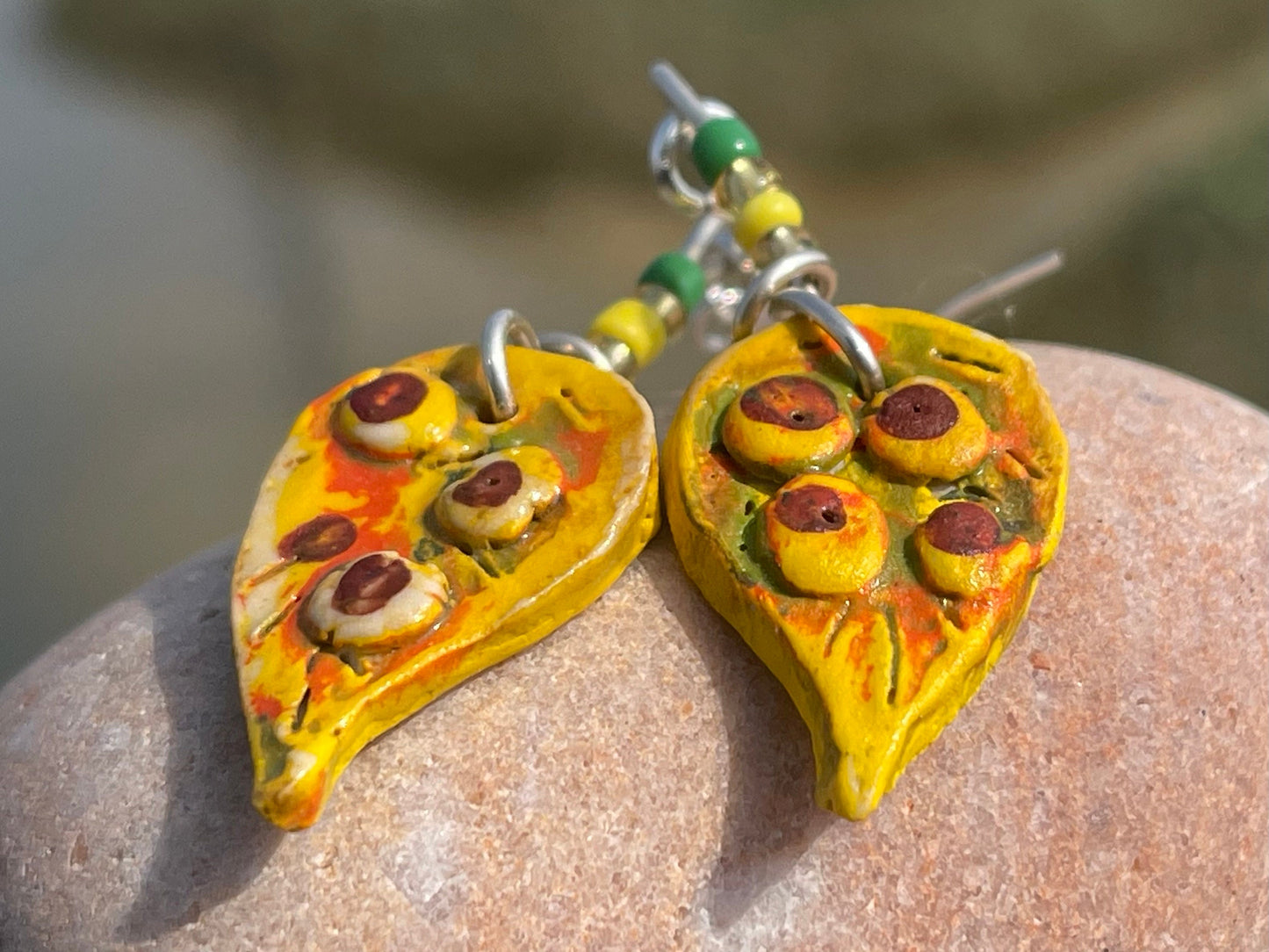 Handmade earrings using Sussex clay. Unique jewellery, ceramic earrings, boho jewellery, yellow earrings, unique earrings, yellow jewellery