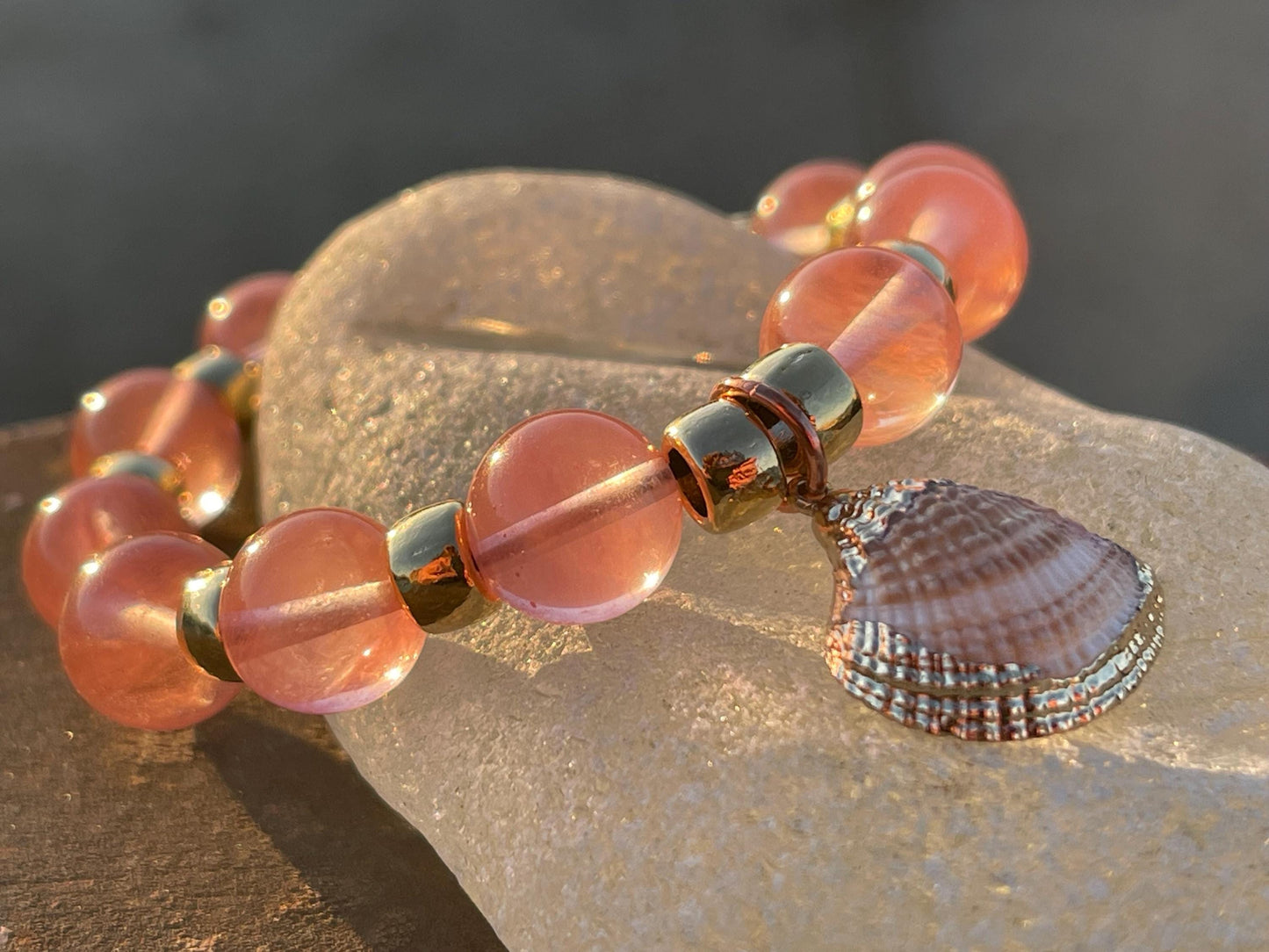 Strawberry quartz bracelet showcasing a little scallop shell. Shell jewellery, quartz bangle, ethical jewellery, handmade pink bracelet