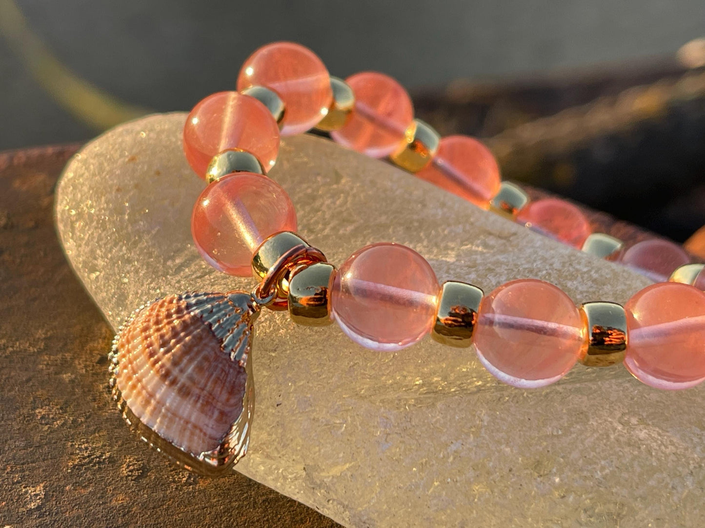 Strawberry quartz bracelet showcasing a little scallop shell. Shell jewellery, quartz bangle, ethical jewellery, handmade pink bracelet