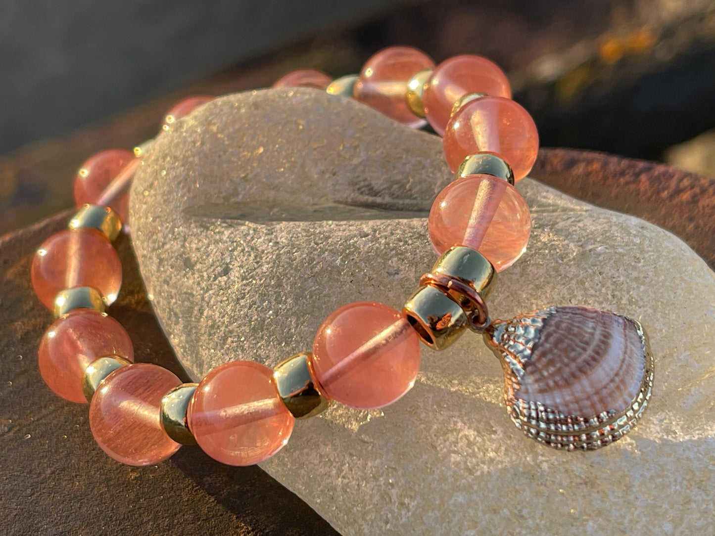 Strawberry quartz bracelet showcasing a little scallop shell. Shell jewellery, quartz bangle, ethical jewellery, handmade pink bracelet