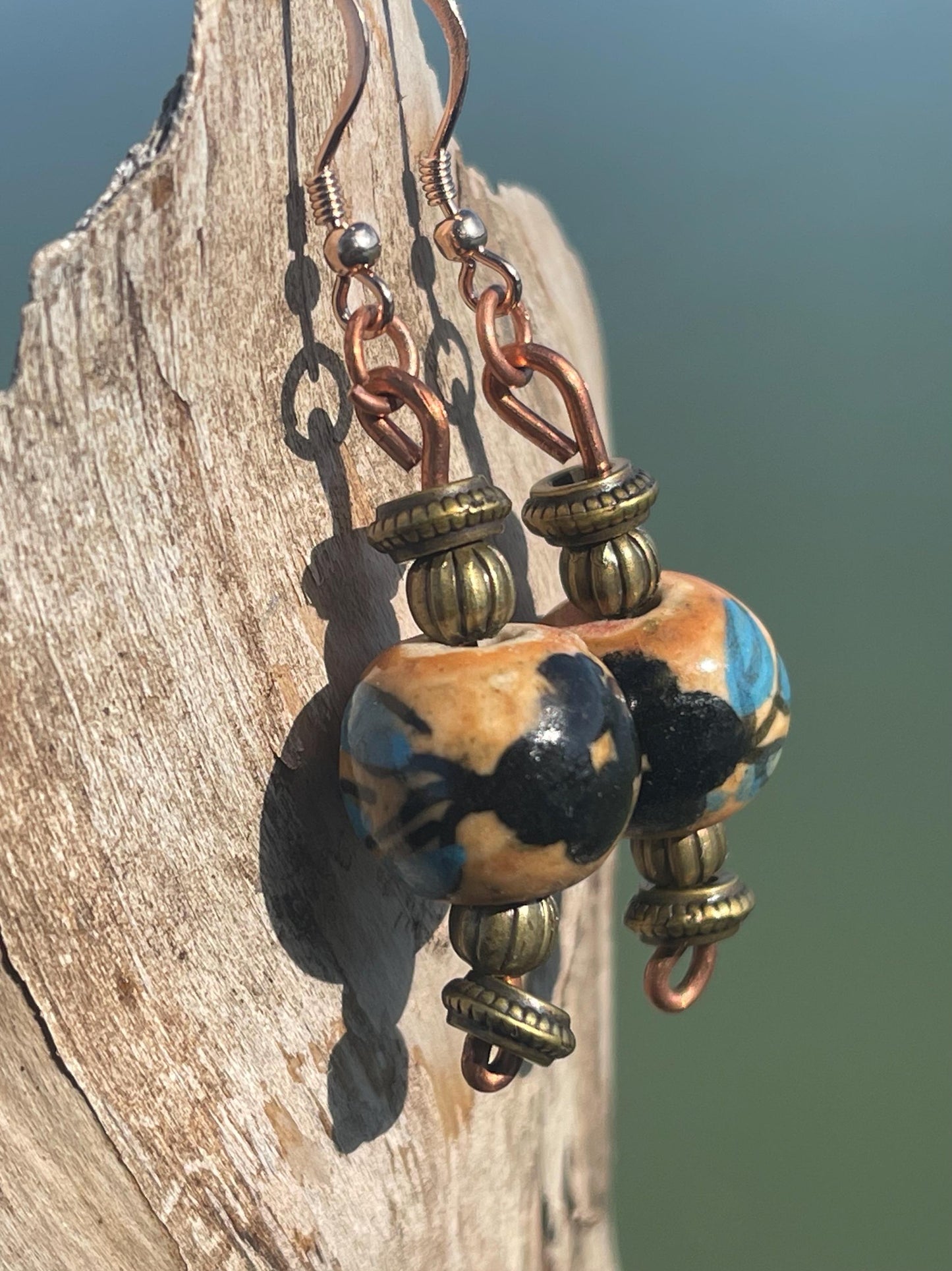 Eco friendly earrings made from vintage beads and recycled copper. Hypoallergenic rose gold ear hooks. Ethical handmade jewellery. Boho.