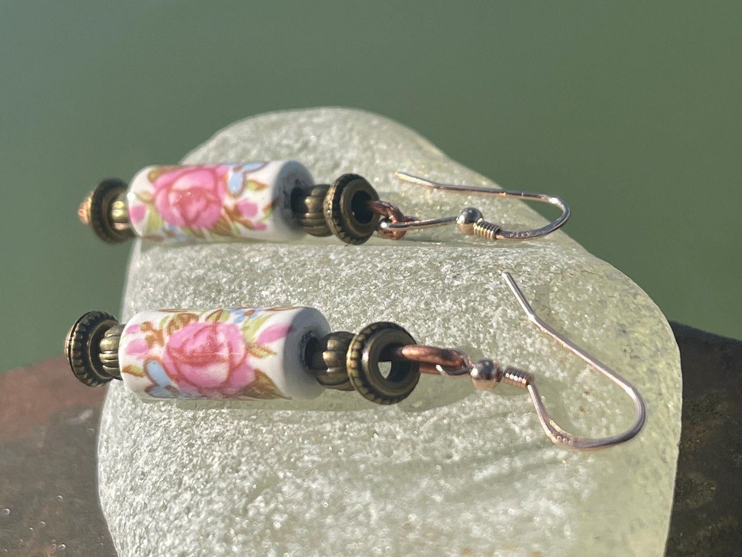 Eco friendly earrings made from vintage beads and recycled copper. Hypoallergenic rose gold ear hooks. Ethical handmade jewellery.