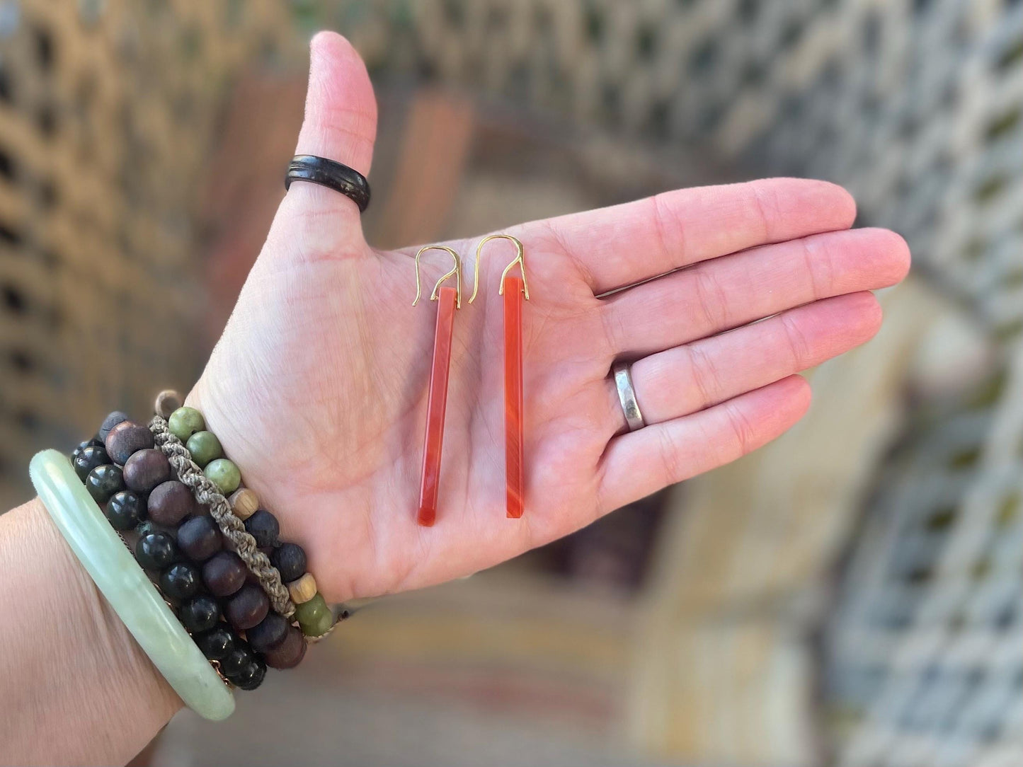 Long red agate gemstone earrings. Orange statement earrings. Long orange earrings. Unique jewellery. Ethical handmade jewellery.