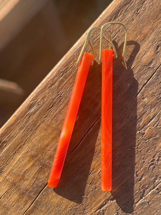 Long red agate gemstone earrings. Orange statement earrings. Long orange earrings. Unique jewellery. Ethical handmade jewellery.