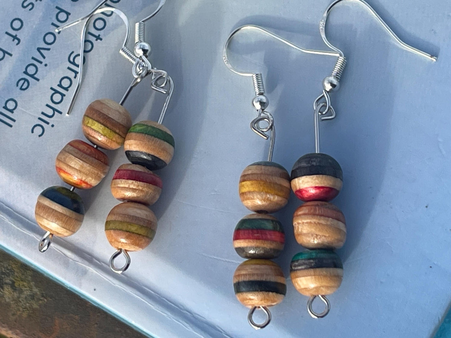 Handmade earrings made from old skateboards. Skateboard earrings. Skater jewellery. Sustainable jewellery. Eco friendly earrings. Cool gifts