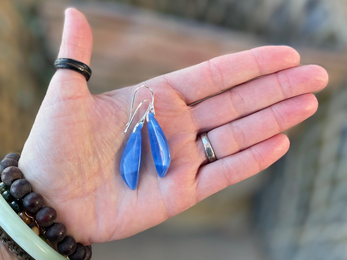 Blue onyx gemstone earrings. Long drop dangly earrings. Blue gemstone earrings. Ethical jewellery, blue jewellery. Handmade onyx jewellery.