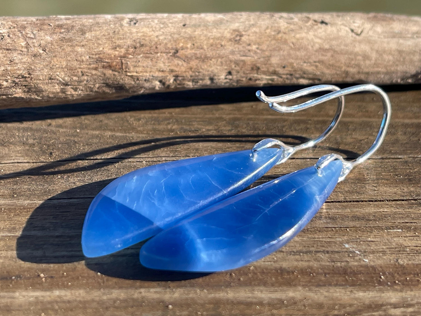 Blue onyx gemstone earrings. Long drop dangly earrings. Blue gemstone earrings. Ethical jewellery, blue jewellery. Handmade onyx jewellery.