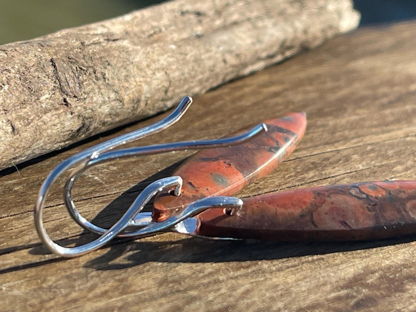 Orange rhyolite gemstone earrings. Long drop dangly earrings. Orange gemstone earrings. Ethical jewellery, orange jewellery. Handmade.