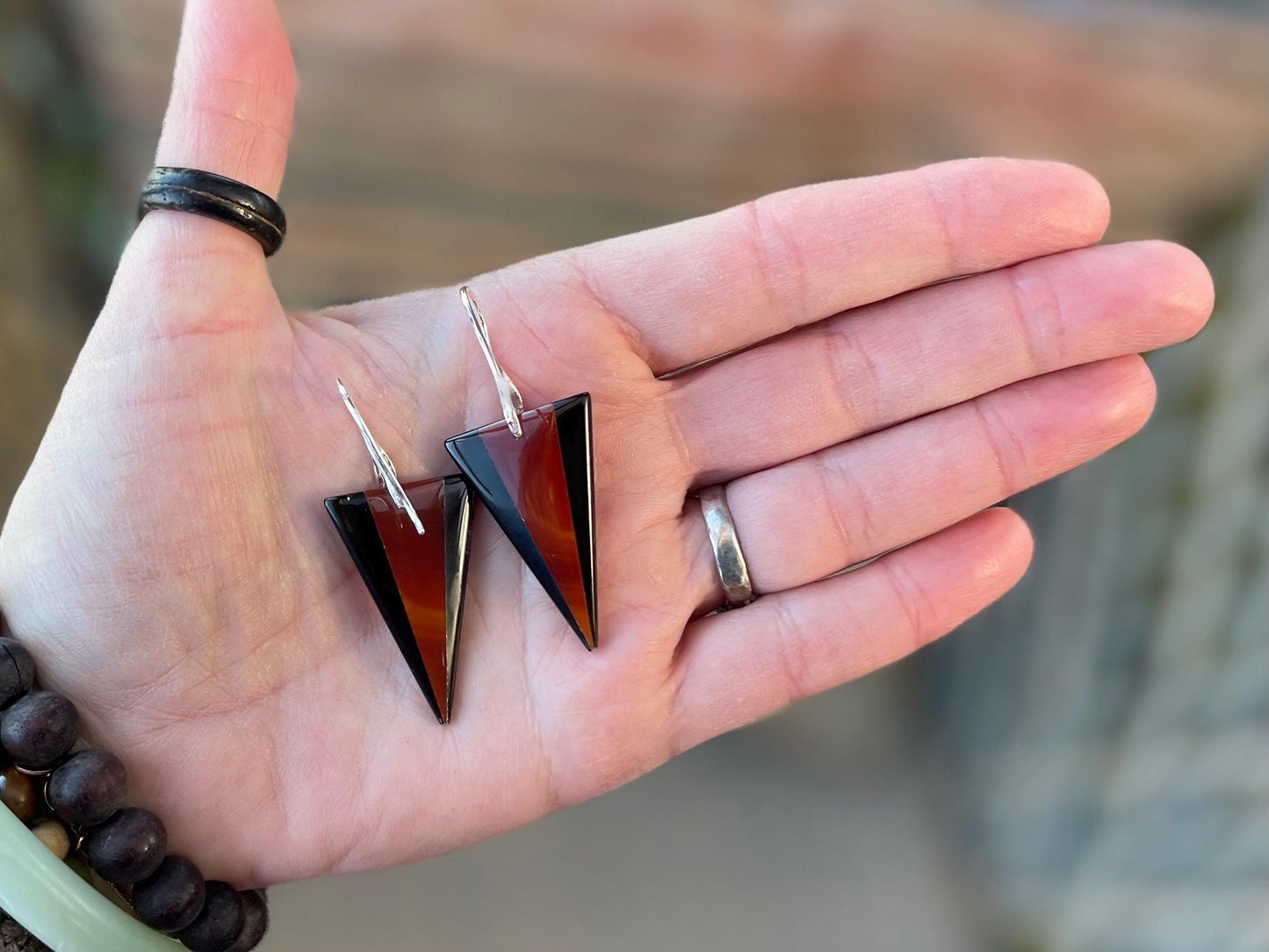 Obsidian and red agate gemstone earrings on sterling silver. Ethical and unique jewellery. Red and black earrings. Unique handmade earrings.