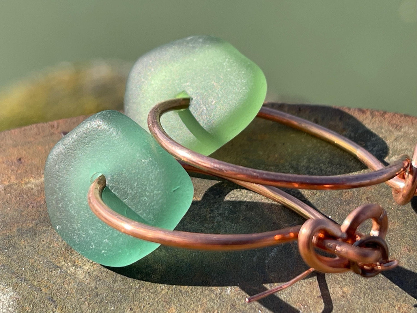 Eco friendly green sea glass and recycled copper earrings. Unique earrings, ethical jewellery, unusual boho jewellery, sea glass jewellery.