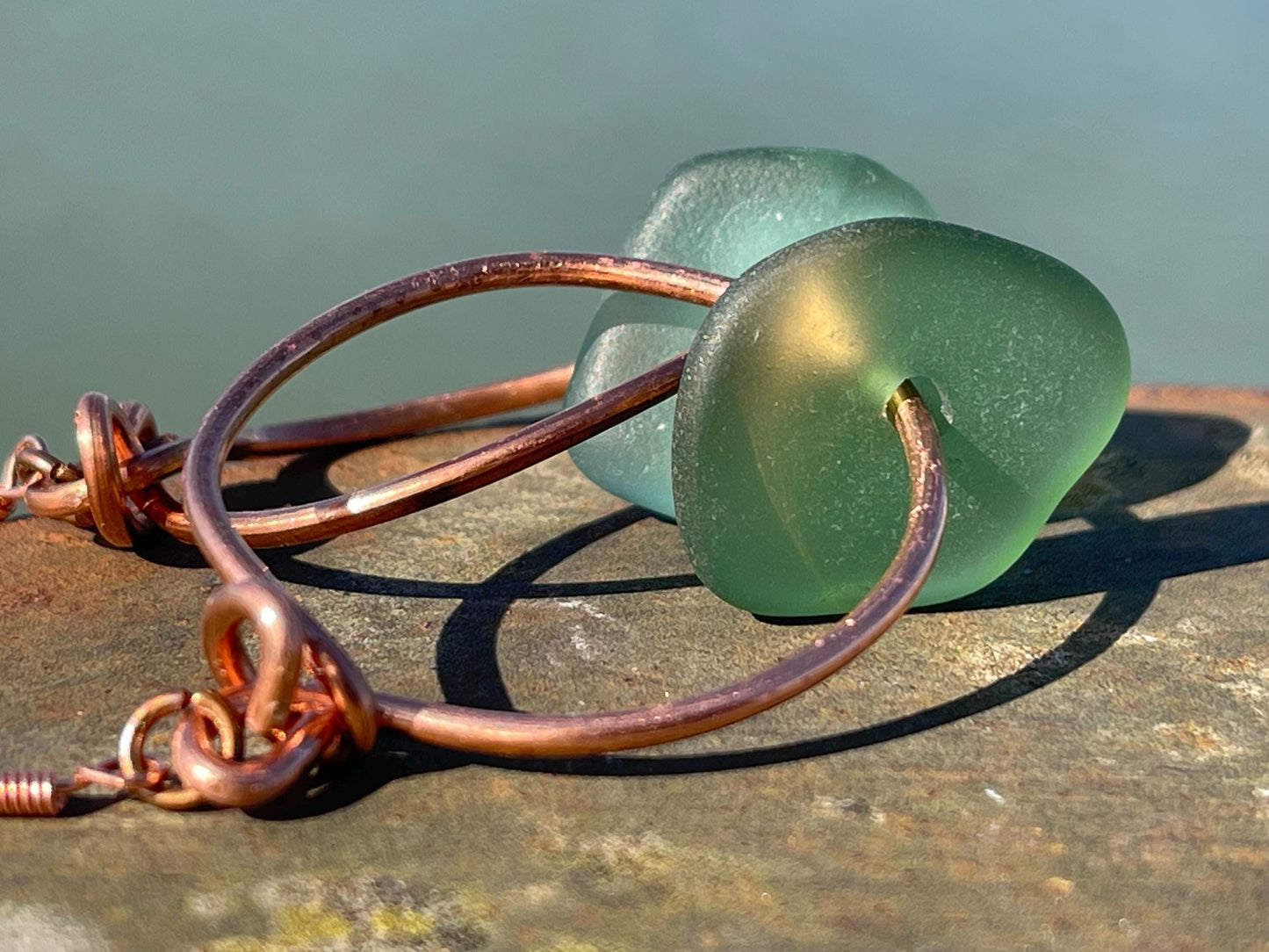 Eco friendly green sea glass and recycled copper earrings. Unique earrings, ethical jewellery, unusual boho jewellery, sea glass jewellery.