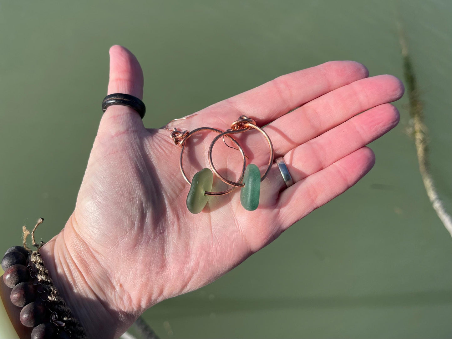 Eco friendly green sea glass and recycled copper earrings. Unique earrings, ethical jewellery, unusual boho jewellery, sea glass jewellery.