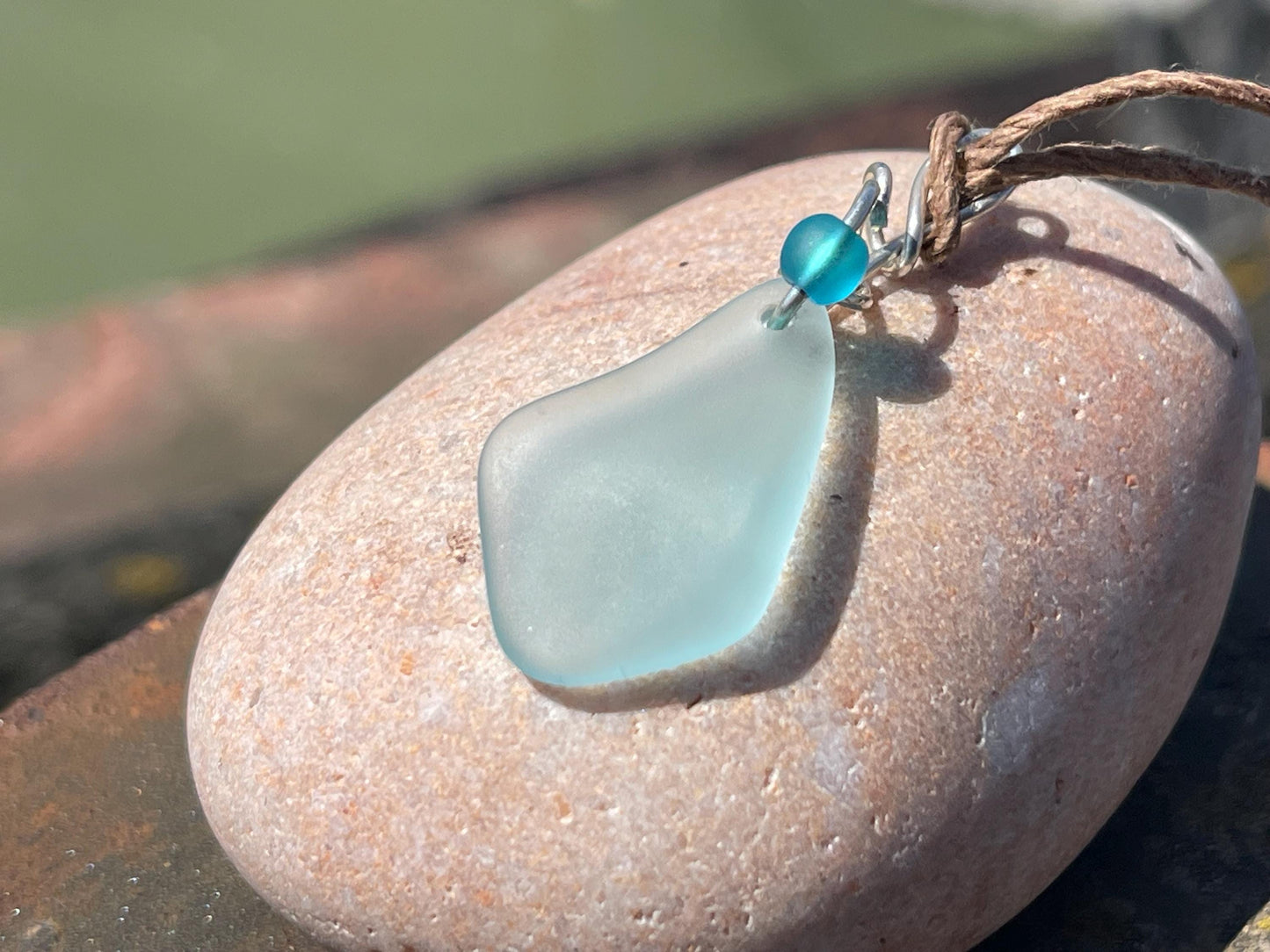 Eco friendly necklace made with sea glass on recycled sterling silver. Ethical jewellery. Handmade eco friendly jewellery. Aqua sea glass.