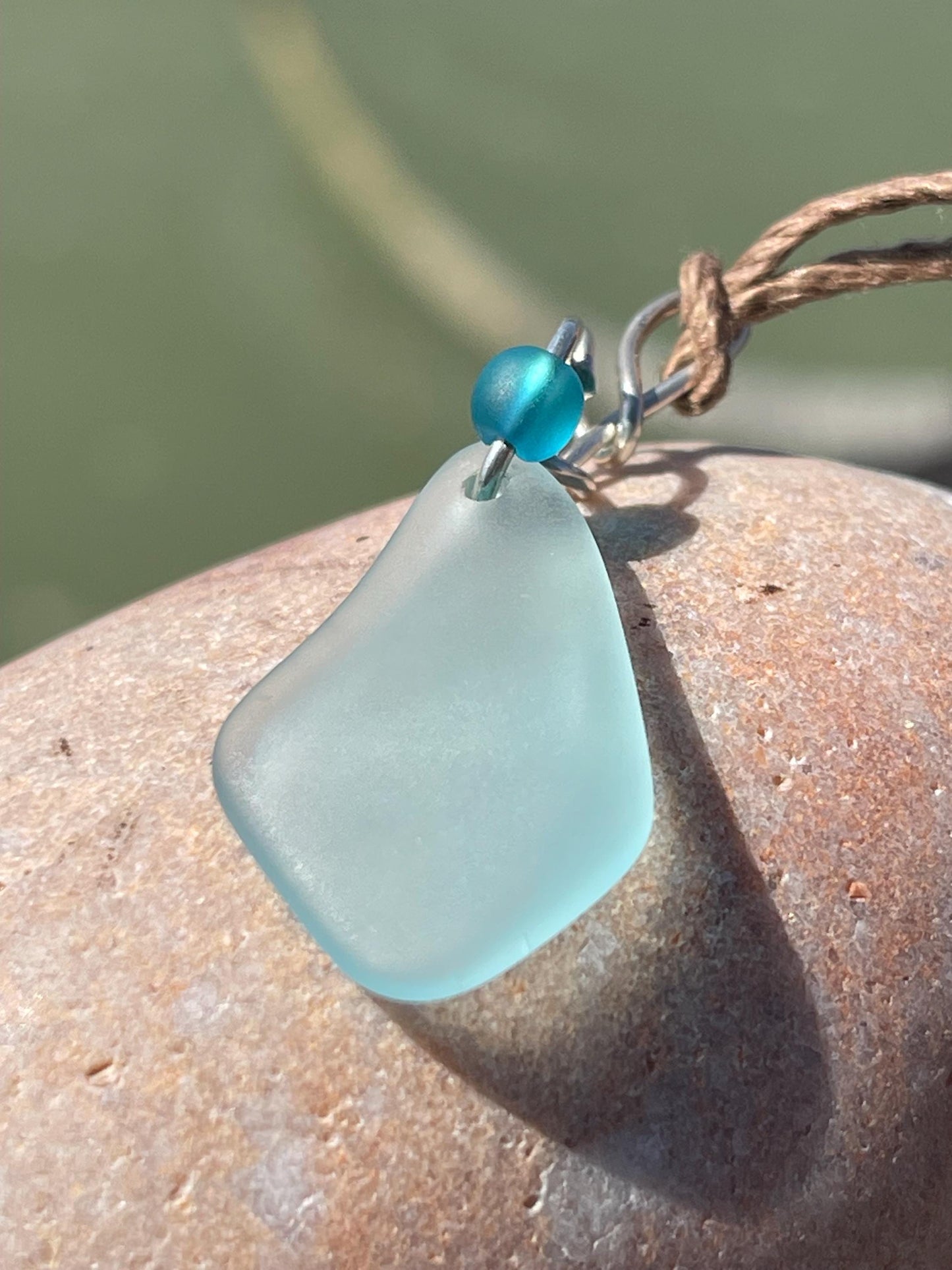 Eco friendly necklace made with sea glass on recycled sterling silver. Ethical jewellery. Handmade eco friendly jewellery. Aqua sea glass.