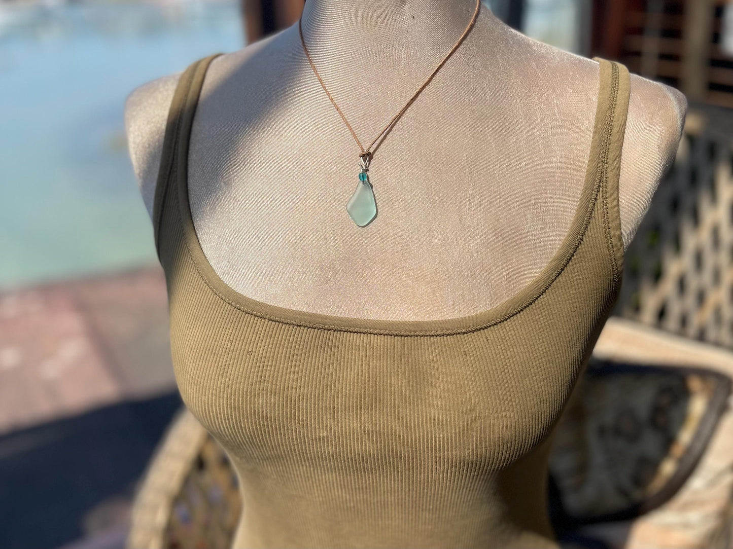 Eco friendly necklace made with sea glass on recycled sterling silver. Ethical jewellery. Handmade eco friendly jewellery. Aqua sea glass.