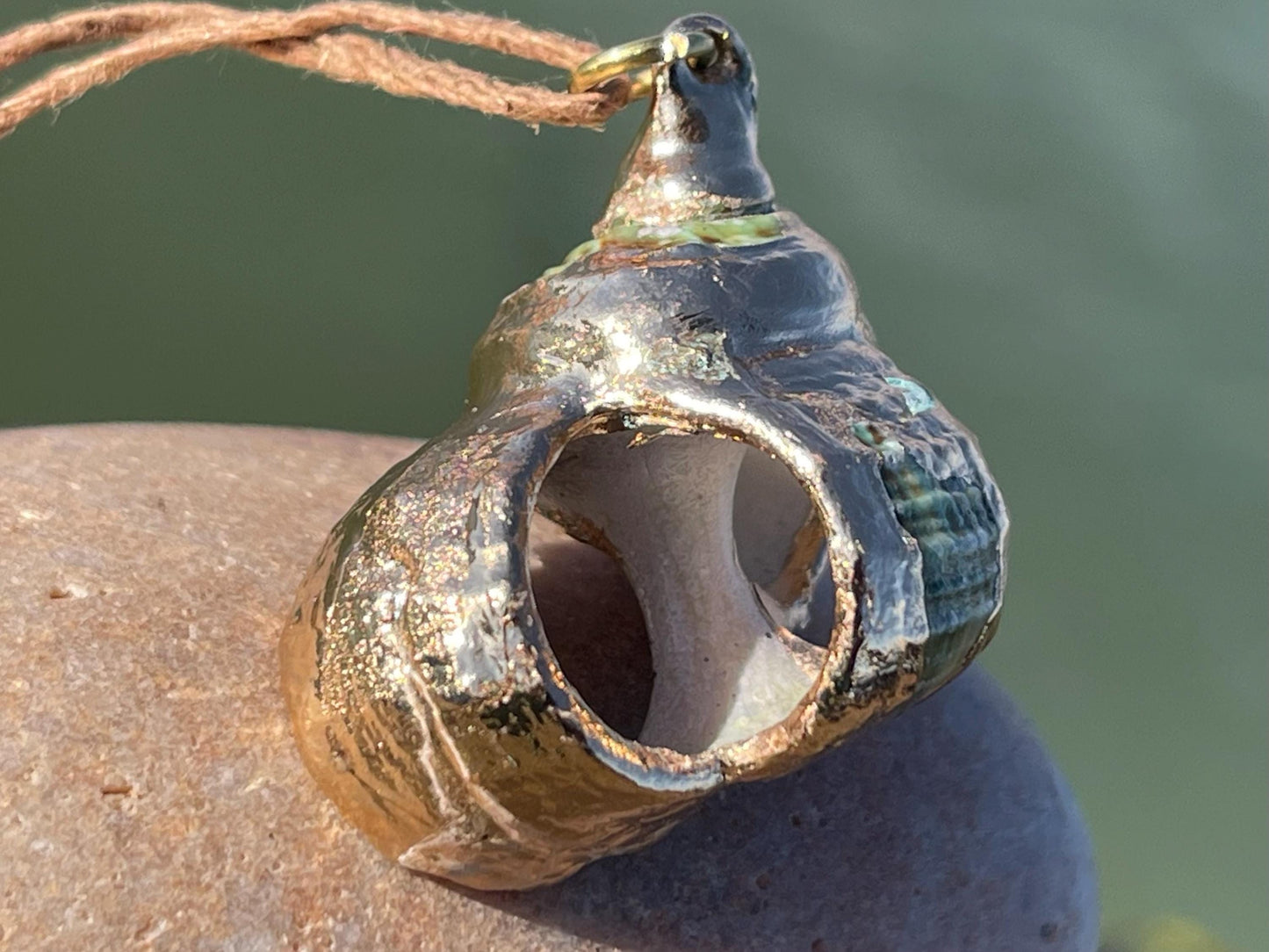 Large painted gold shell necklace held on recycled brass and sustainable hemp. Shell jewellery. Boho jewellery. Eco friendly gifts.