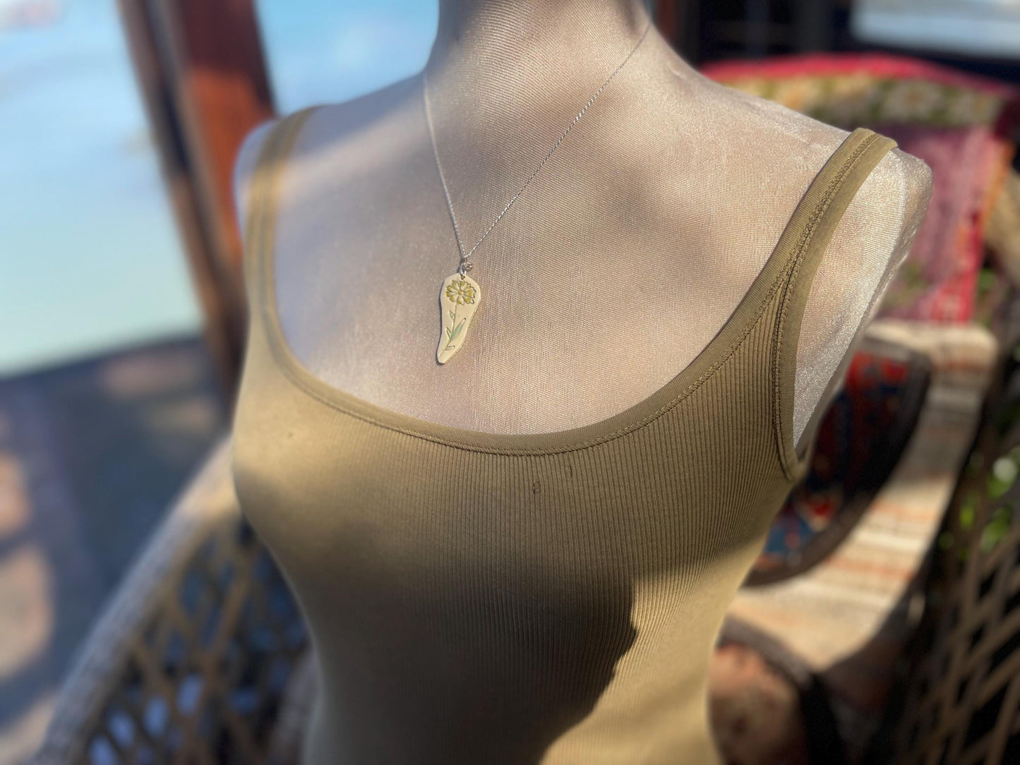 Handmade daisy necklace. Eco friendly jewellery. Ethical pendants made with waste clay and recycled sterling silver. Ethical jewellery.