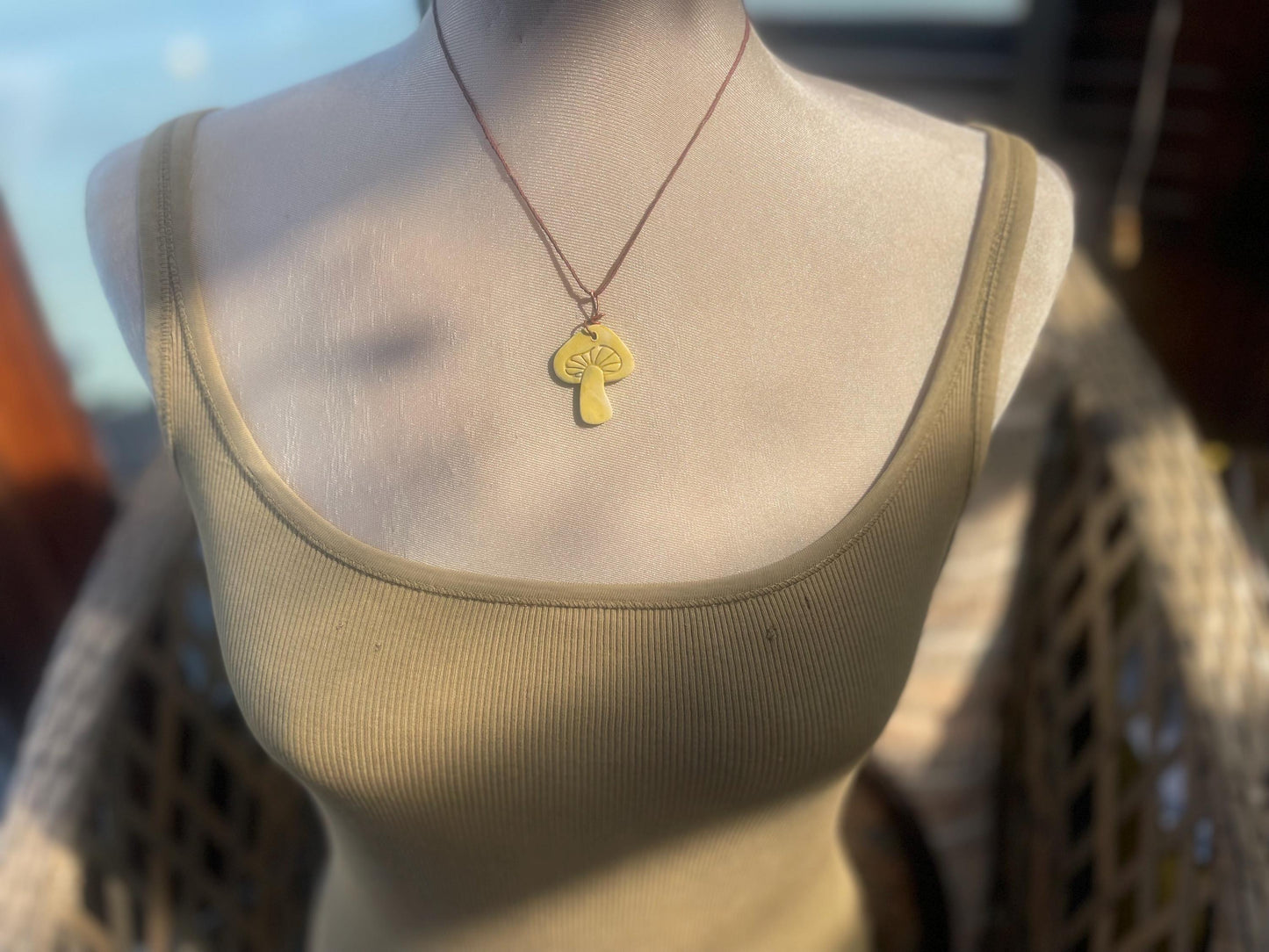 Handmade mushroom necklaces. Eco friendly jewellery. Ethical pendants made with waste clay and burnt recycled copper. Ethical jewellery.