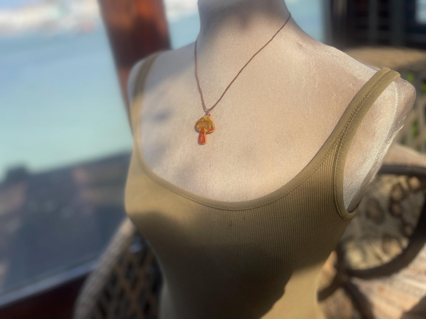 Handmade mushroom necklaces. Eco friendly jewellery. Ethical pendants made with waste clay and burnt recycled copper. Ethical jewellery.