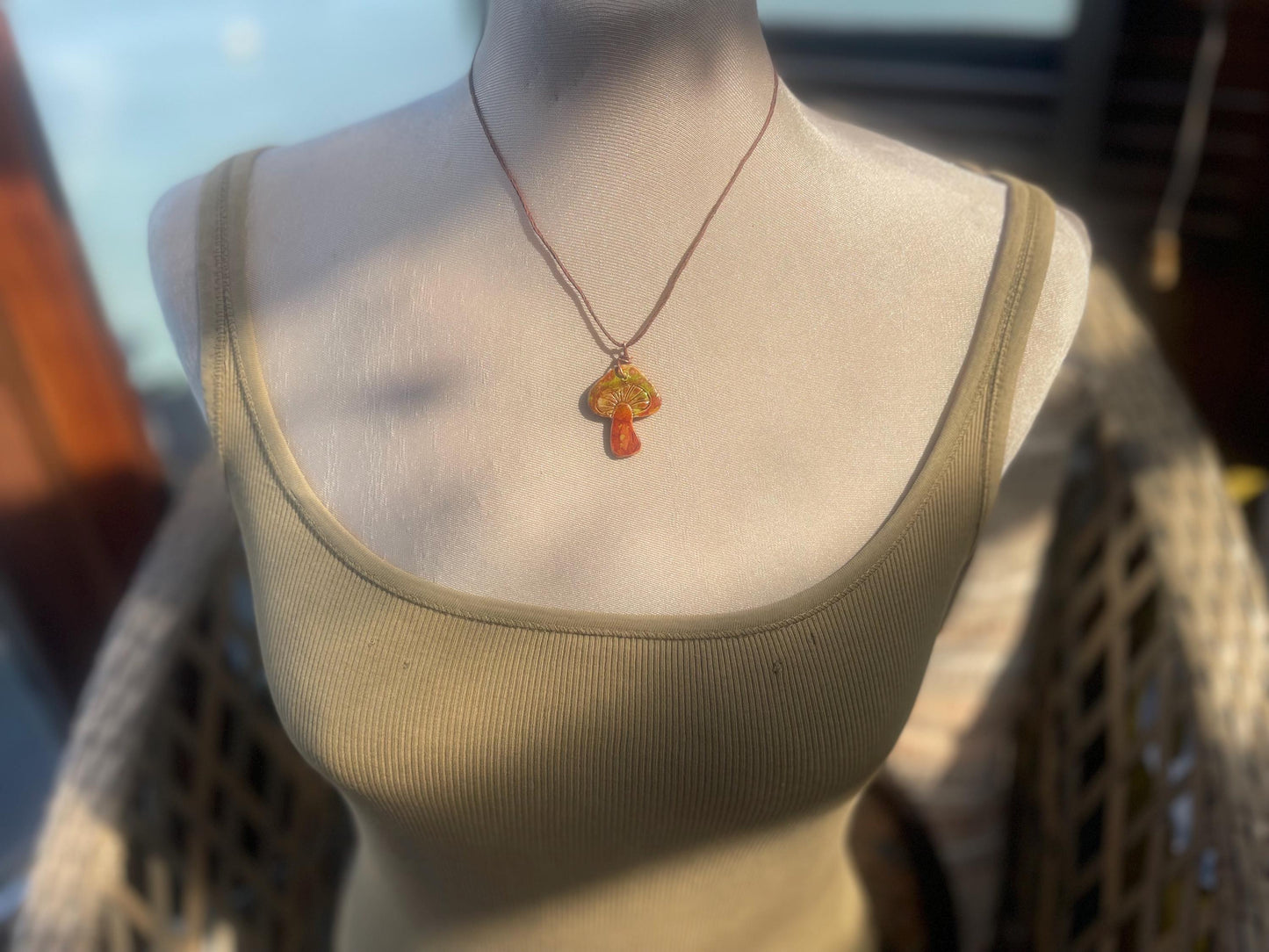 Handmade mushroom necklaces. Eco friendly jewellery. Ethical pendants made with waste clay and burnt recycled copper. Ethical jewellery.
