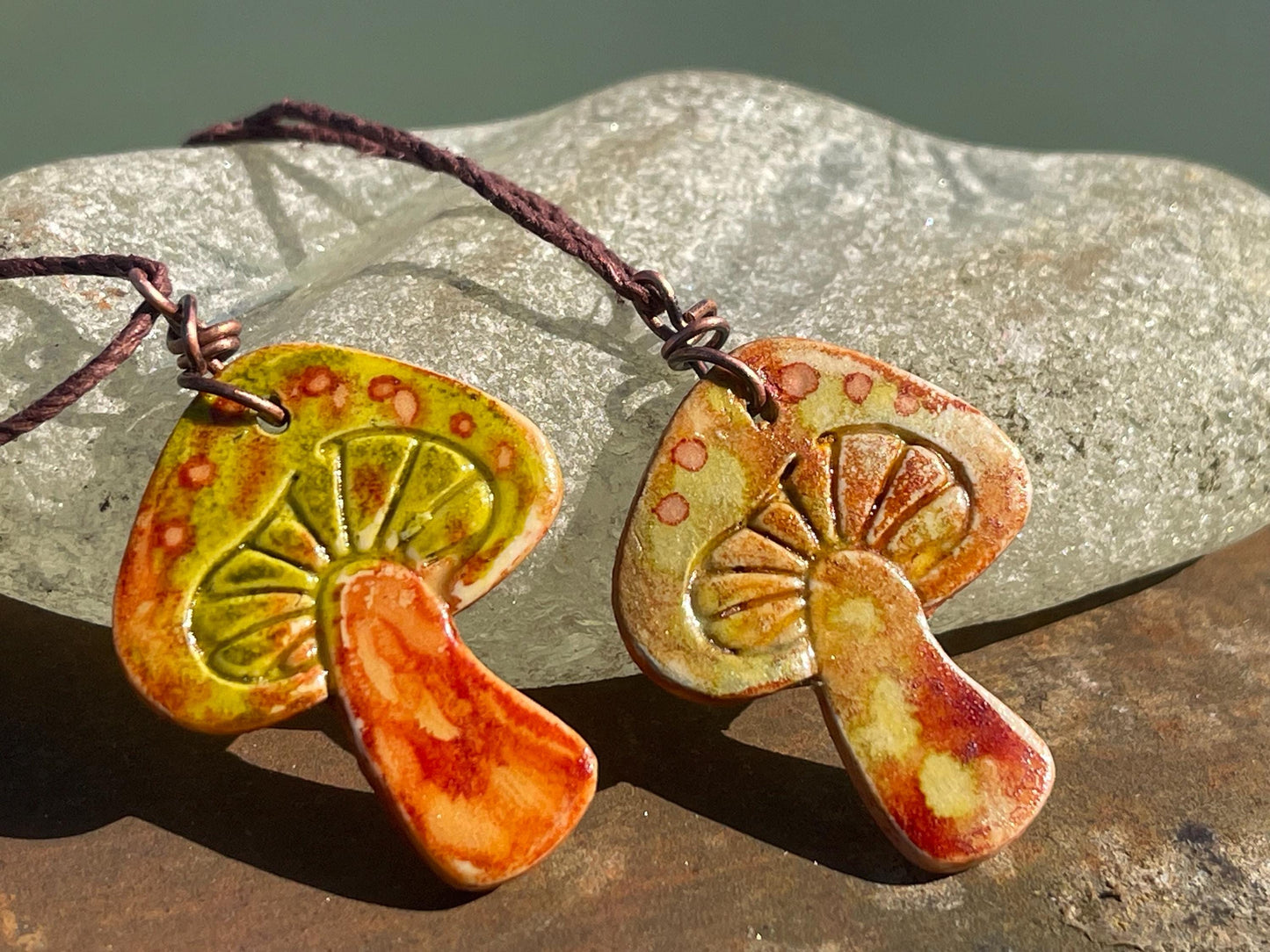 Handmade mushroom necklaces. Eco friendly jewellery. Ethical pendants made with waste clay and burnt recycled copper. Ethical jewellery.