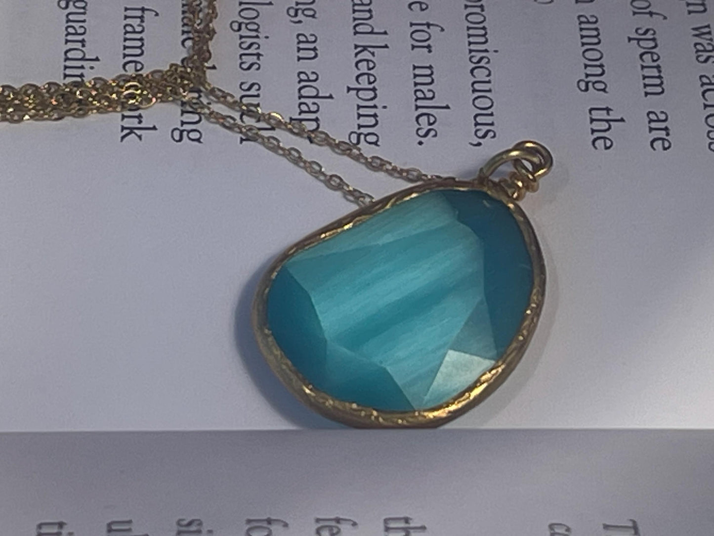 Stunning blue necklace on a recycled adjustable chain. Unusual and beautiful jewellery. Ethical, sustainable and eco friendly.