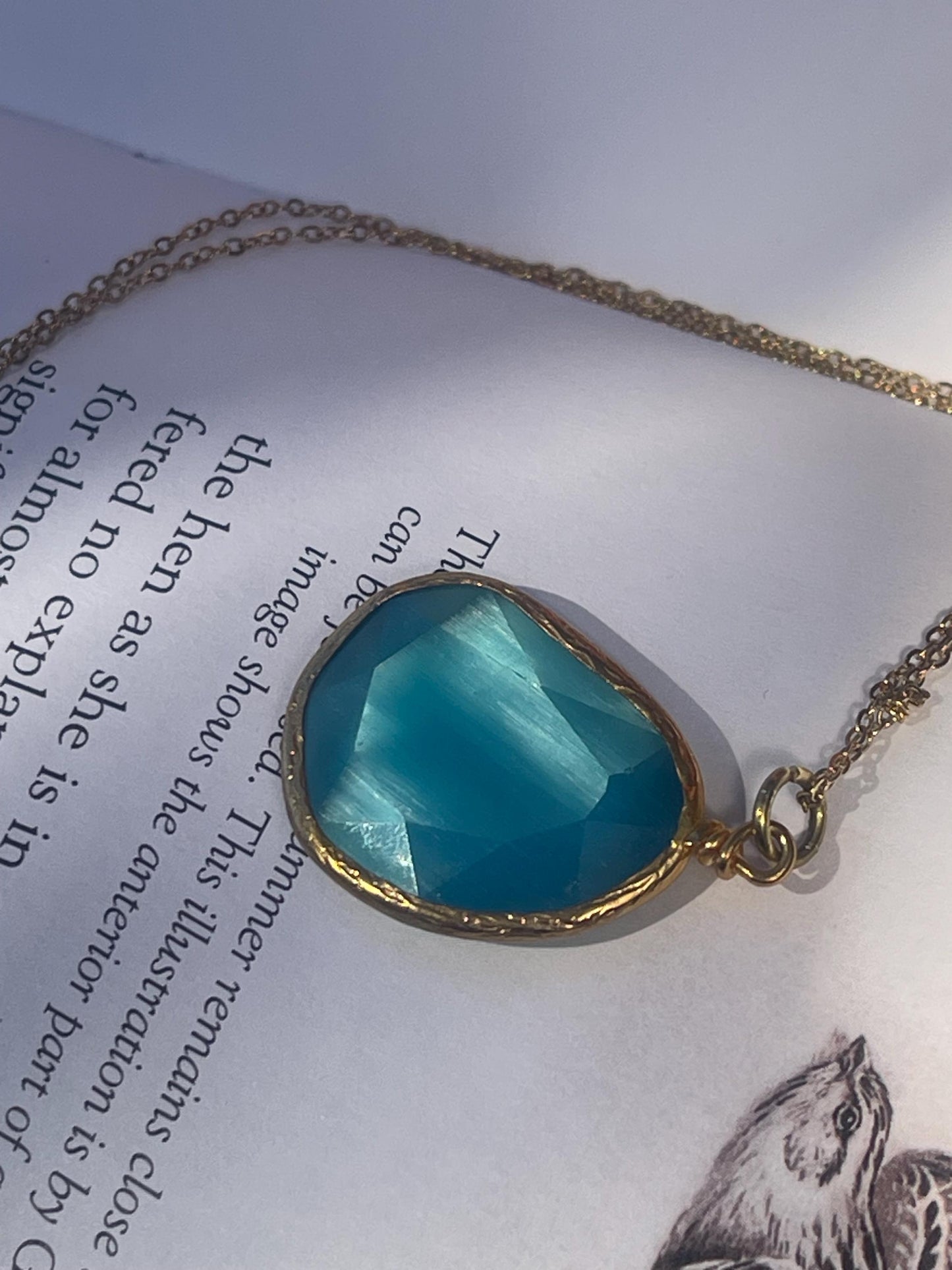 Stunning blue necklace on a recycled adjustable chain. Unusual and beautiful jewellery. Ethical, sustainable and eco friendly.