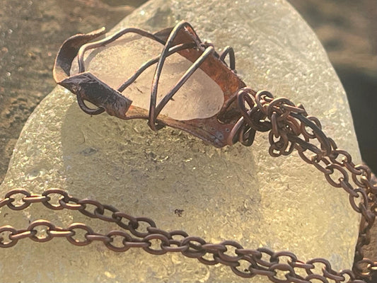 Eco friendly handmade necklace made from sea glass and naturally weathered recycled copper. Ethical jewellery. Unique handmade jewellery.