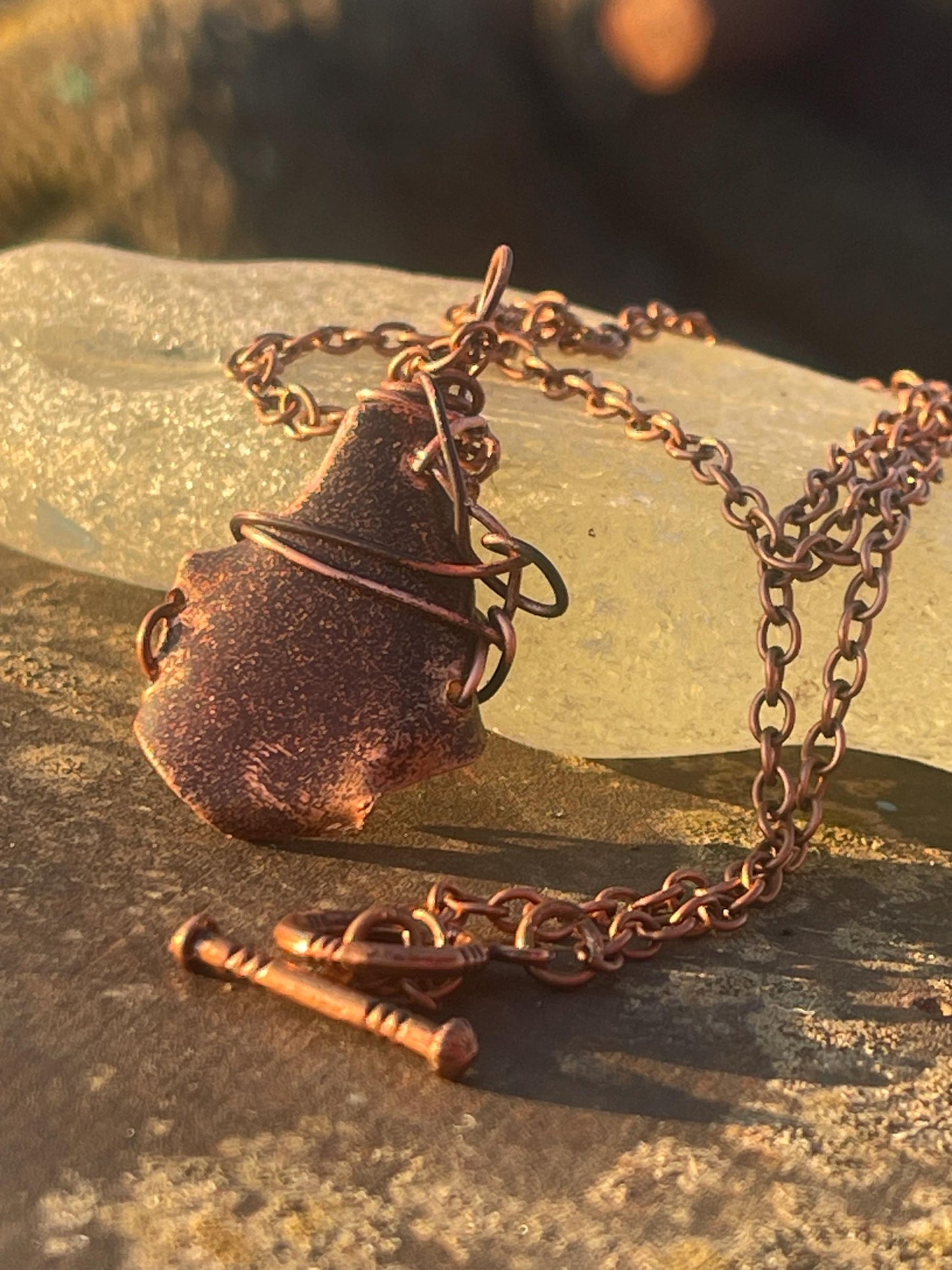 Eco friendly handmade necklace made from sea glass and naturally weathered recycled copper. Ethical jewellery. Unique handmade jewellery.