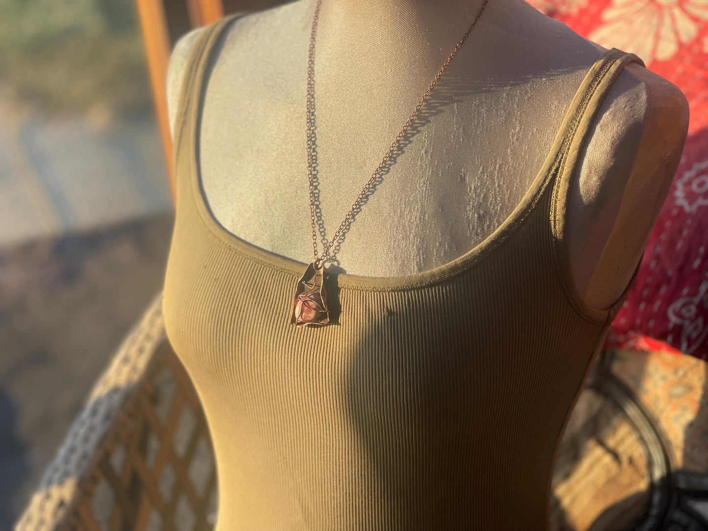 Eco friendly handmade necklace made from Rhodochrosite & naturally weathered recycled copper. Ethical jewellery. Unique handmade jewellery.