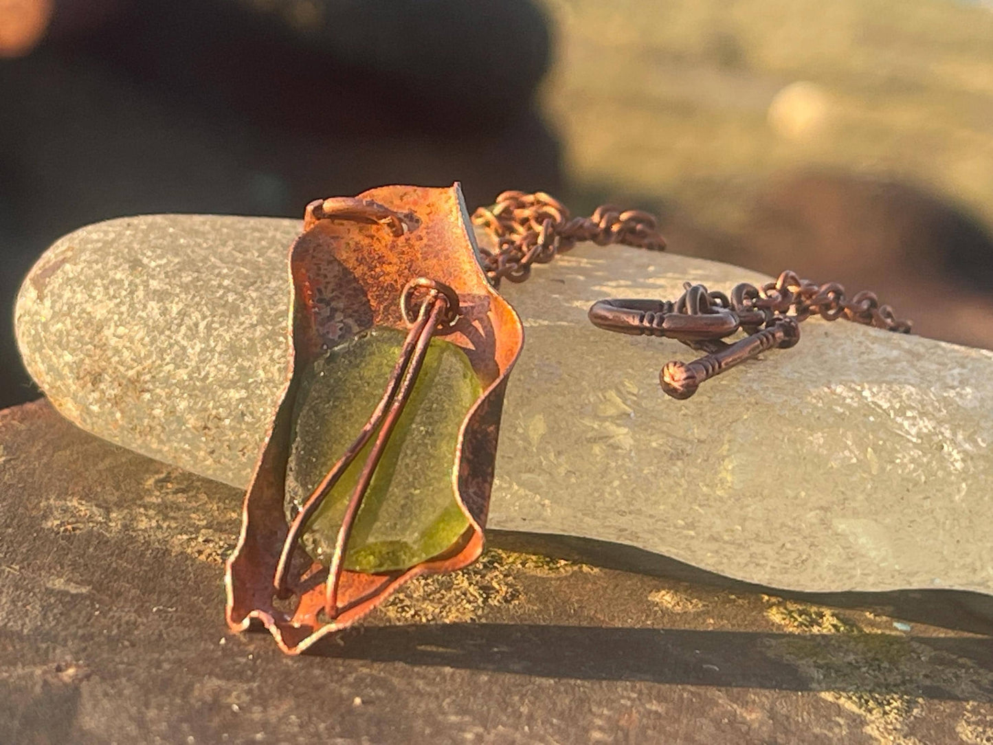 Eco friendly handmade necklace made from sea glass and naturally weathered recycled copper. Ethical jewellery. Unique handmade jewellery.