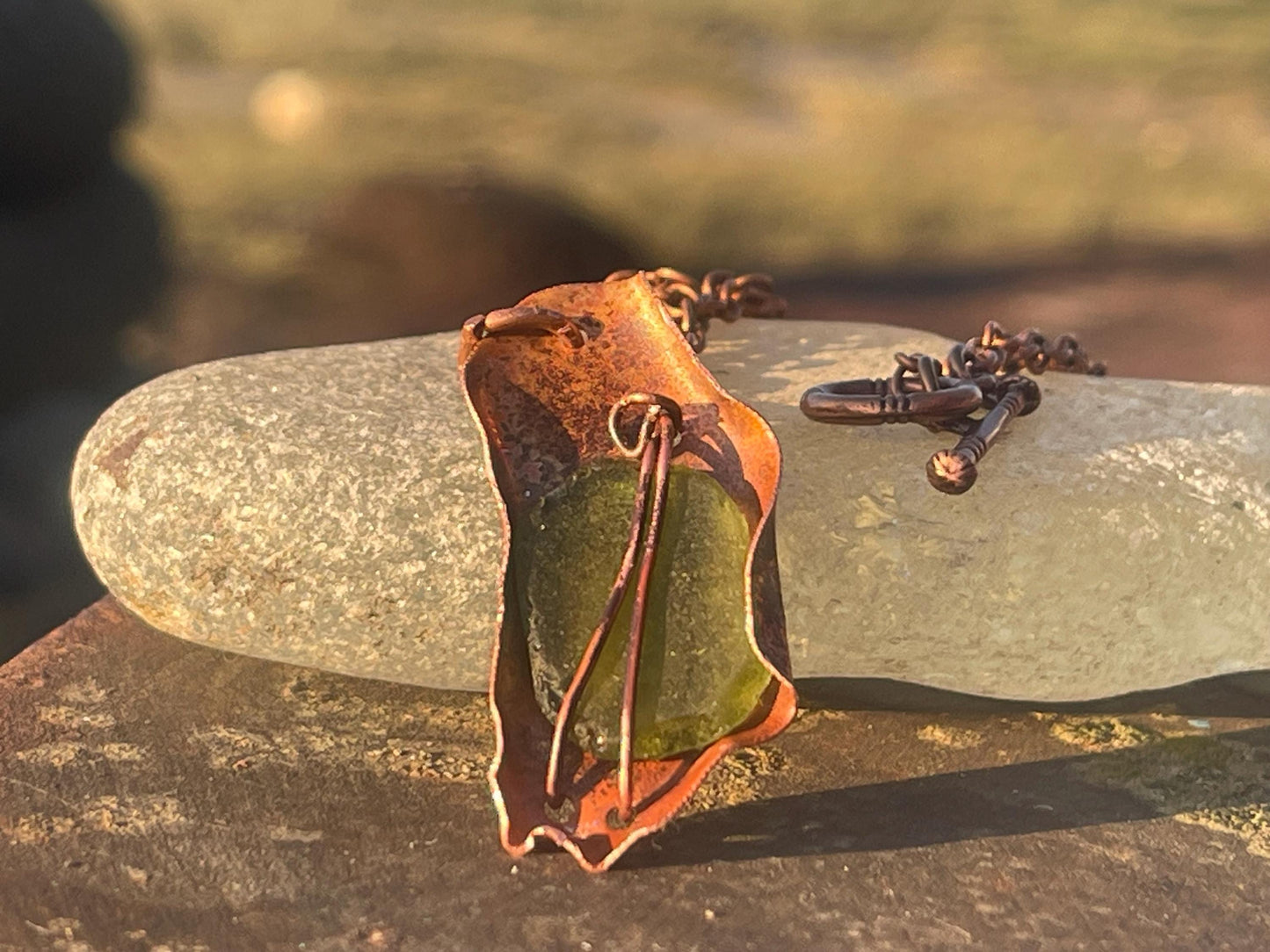 Eco friendly handmade necklace made from sea glass and naturally weathered recycled copper. Ethical jewellery. Unique handmade jewellery.