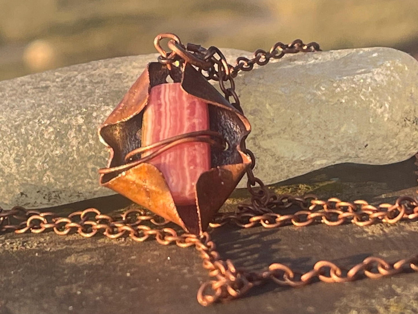 Eco friendly handmade necklace made from Rhodochrosite & naturally weathered recycled copper. Ethical jewellery. Unique handmade jewellery.