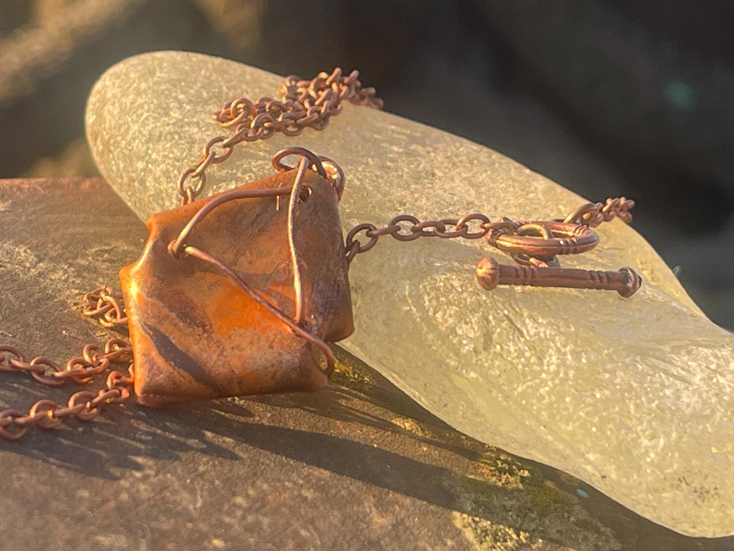 Eco friendly handmade necklace made from Rhodochrosite & naturally weathered recycled copper. Ethical jewellery. Unique handmade jewellery.