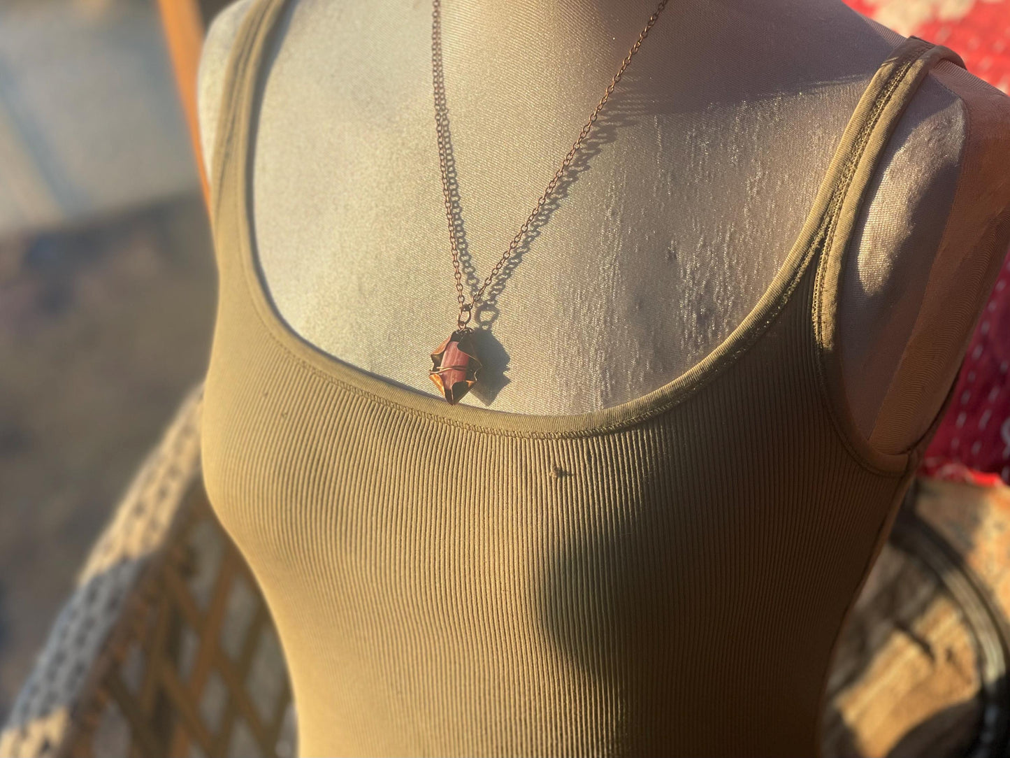 Eco friendly handmade necklace made from Rhodochrosite & naturally weathered recycled copper. Ethical jewellery. Unique handmade jewellery.