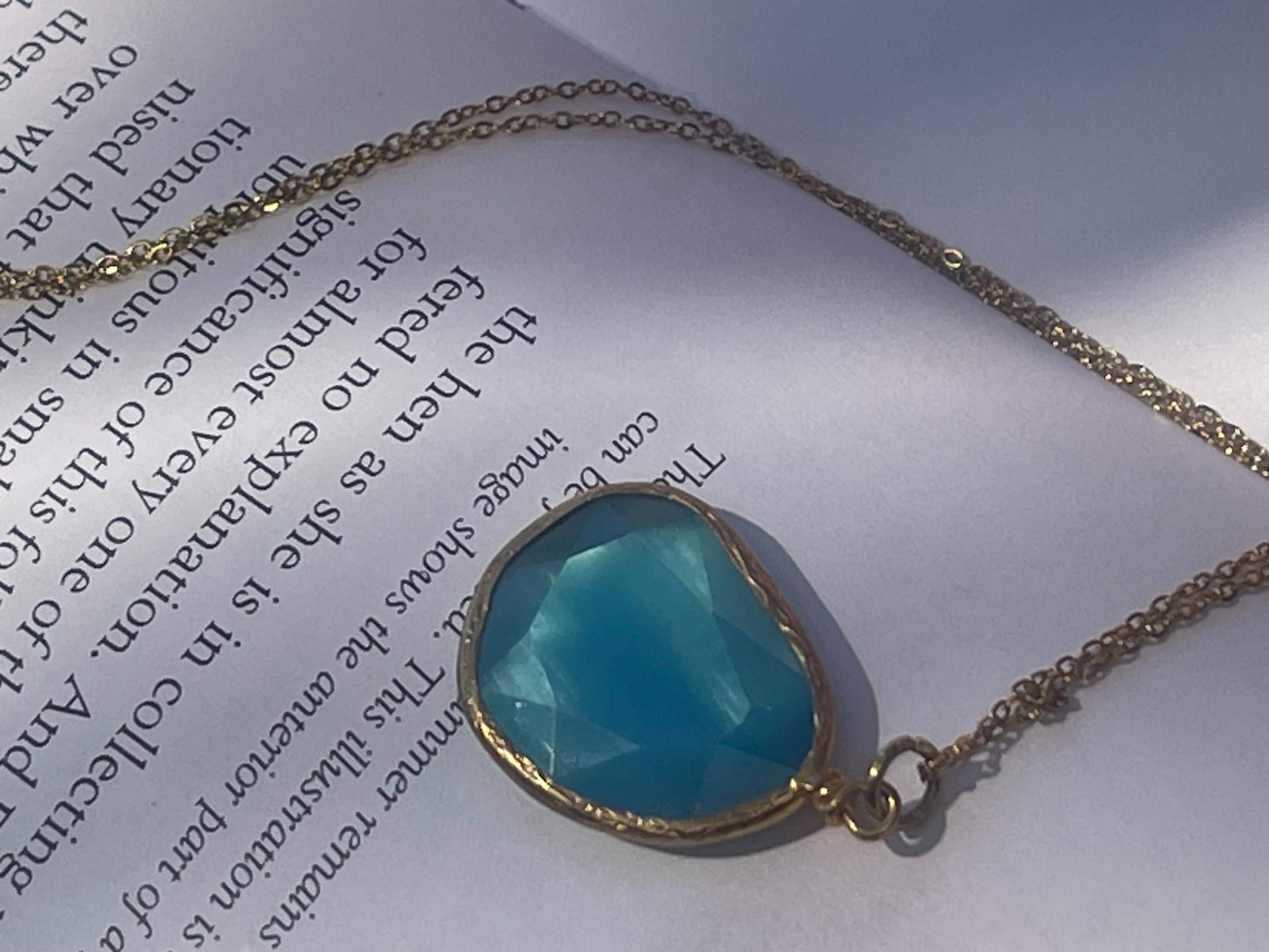 Stunning blue necklace on a recycled adjustable chain. Unusual and beautiful jewellery. Ethical, sustainable and eco friendly.