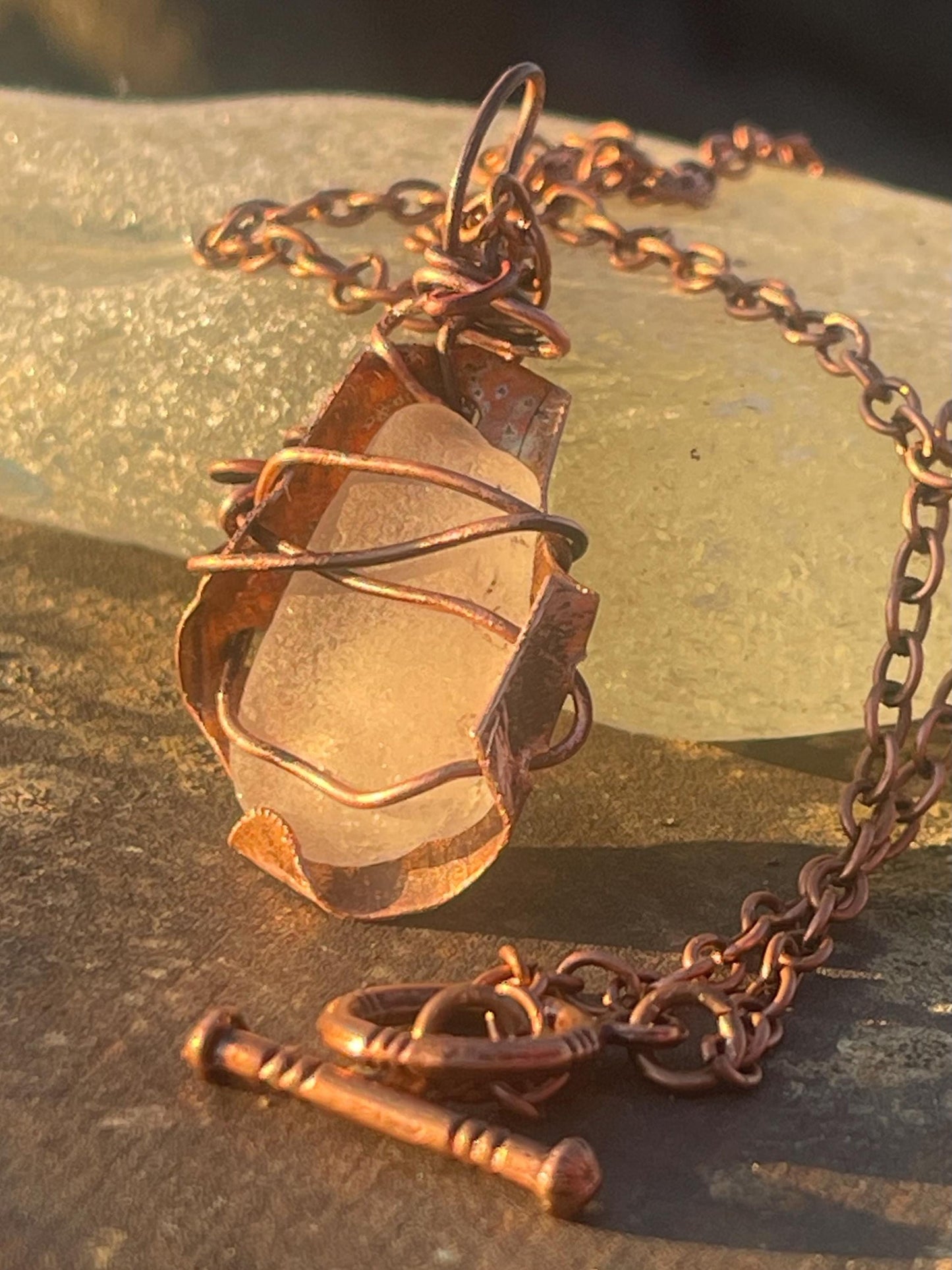 Eco friendly handmade necklace made from sea glass and naturally weathered recycled copper. Ethical jewellery. Unique handmade jewellery.