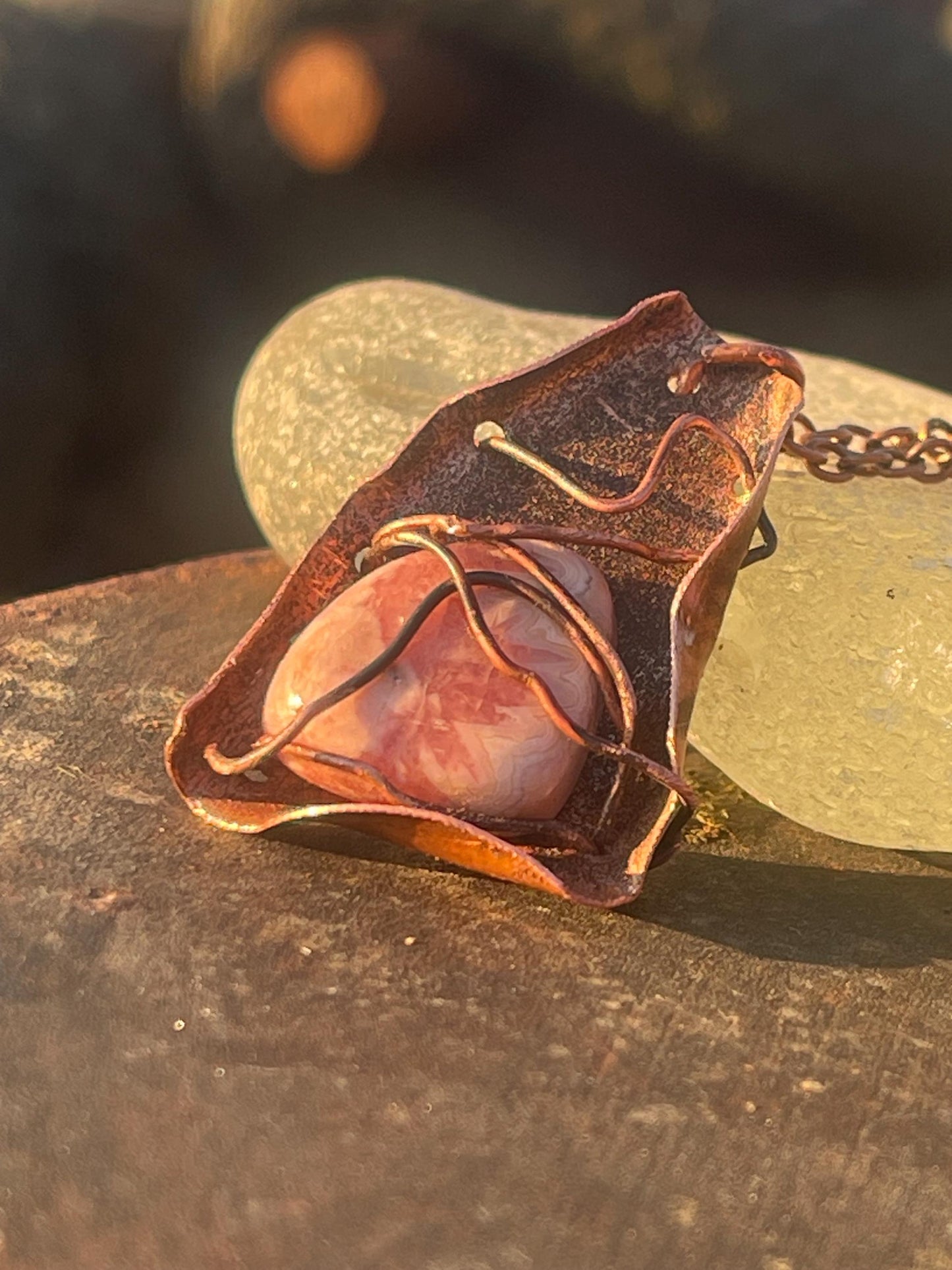 Eco friendly handmade necklace made from Rhodochrosite & naturally weathered recycled copper. Ethical jewellery. Unique handmade jewellery.