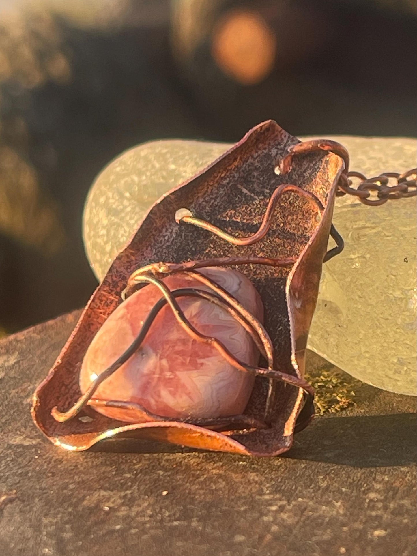 Eco friendly handmade necklace made from Rhodochrosite & naturally weathered recycled copper. Ethical jewellery. Unique handmade jewellery.