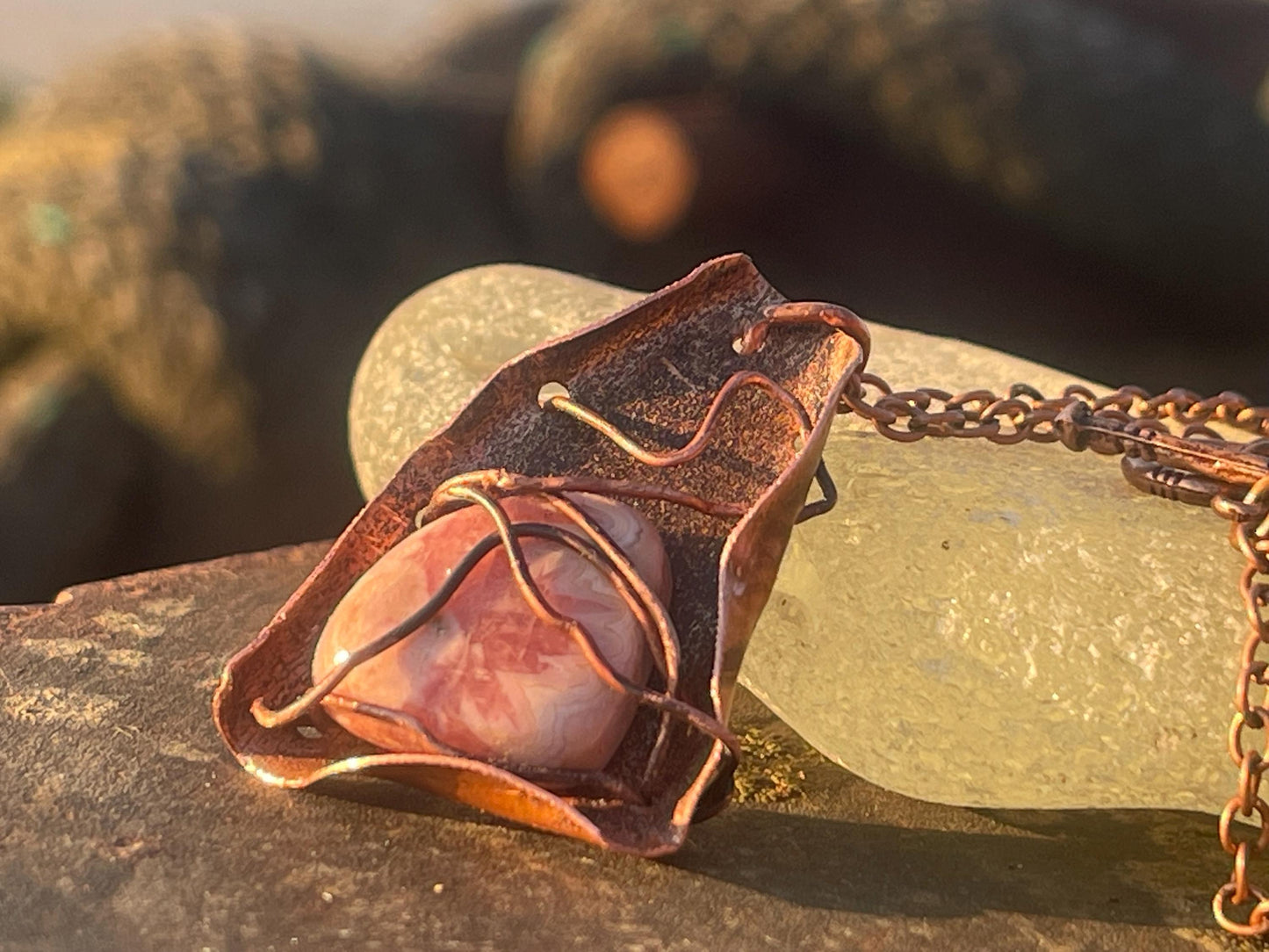 Eco friendly handmade necklace made from Rhodochrosite & naturally weathered recycled copper. Ethical jewellery. Unique handmade jewellery.