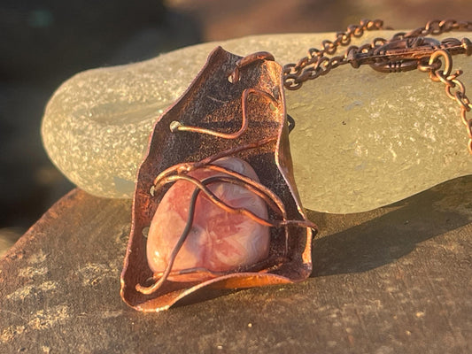 Eco friendly handmade necklace made from Rhodochrosite & naturally weathered recycled copper. Ethical jewellery. Unique handmade jewellery.