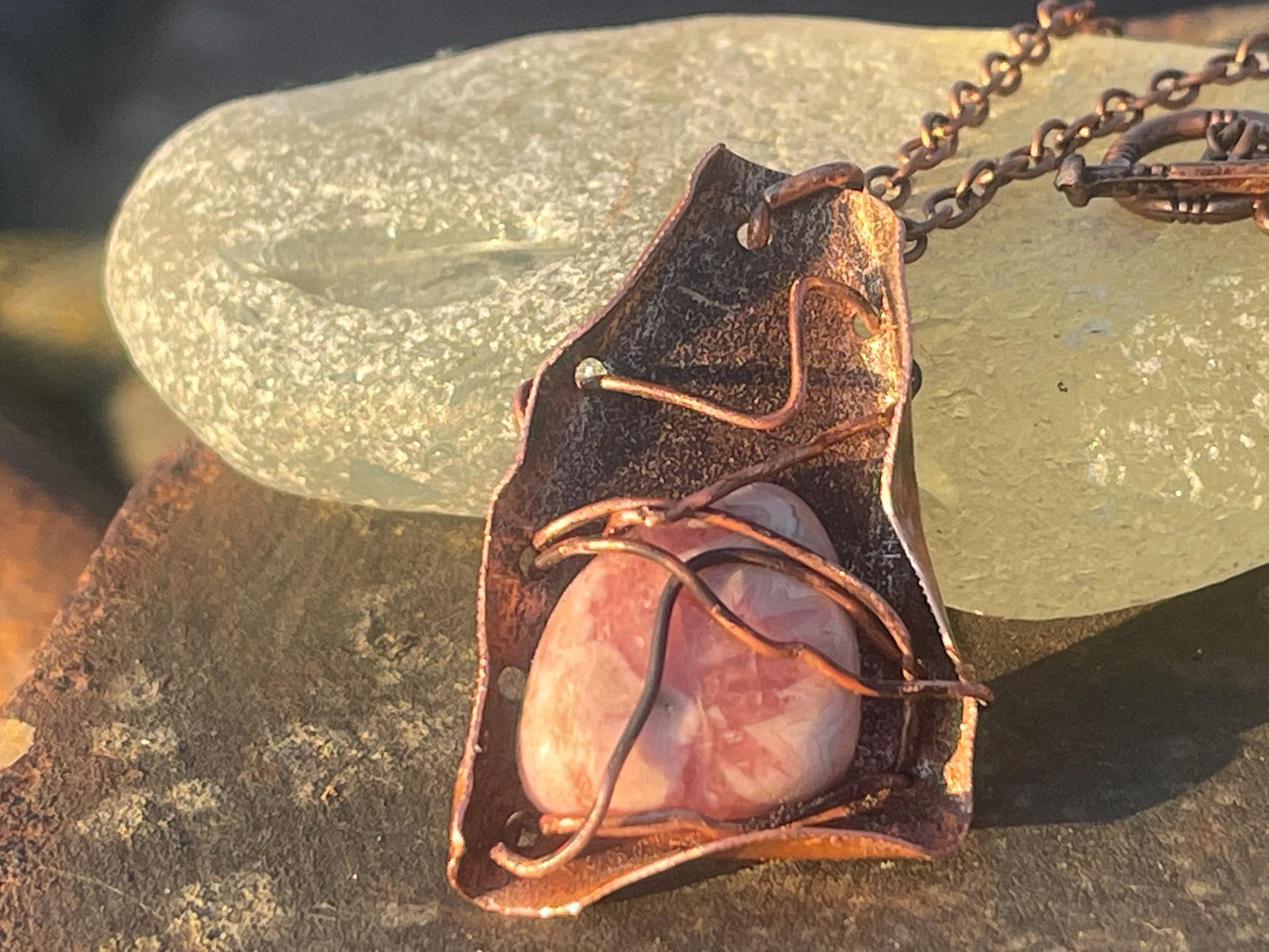 Eco friendly handmade necklace made from Rhodochrosite & naturally weathered recycled copper. Ethical jewellery. Unique handmade jewellery.