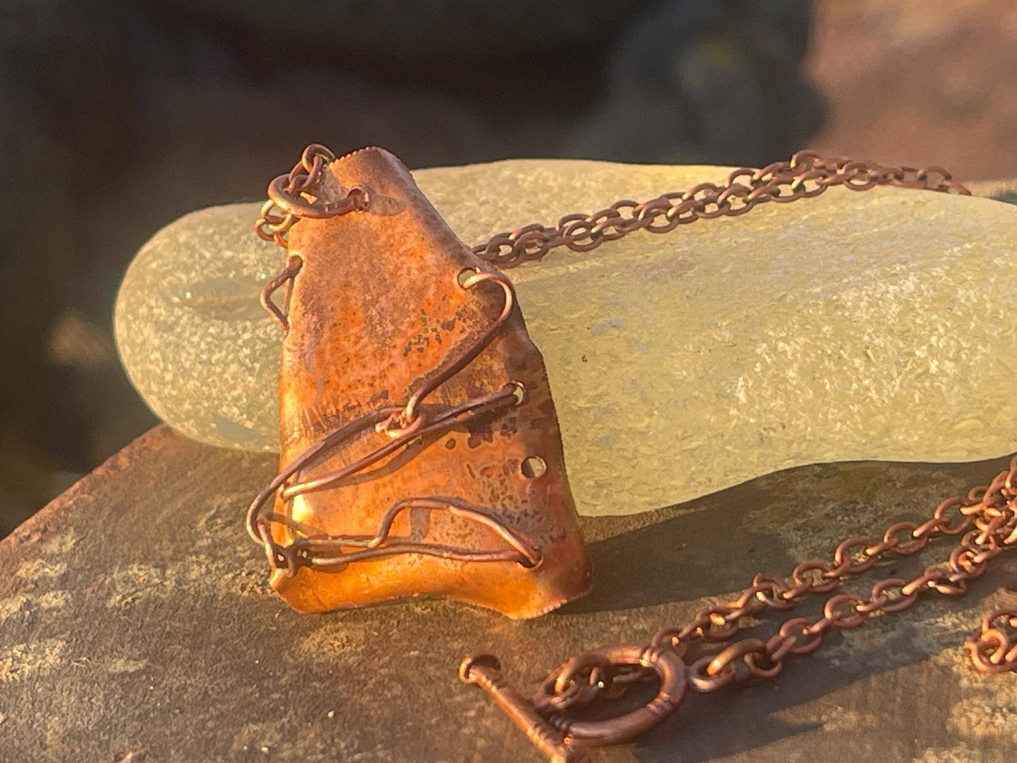 Eco friendly handmade necklace made from Rhodochrosite & naturally weathered recycled copper. Ethical jewellery. Unique handmade jewellery.