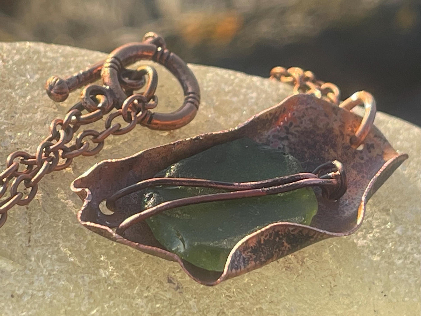 Eco friendly handmade necklace made from sea glass and naturally weathered recycled copper. Ethical jewellery. Unique handmade jewellery.